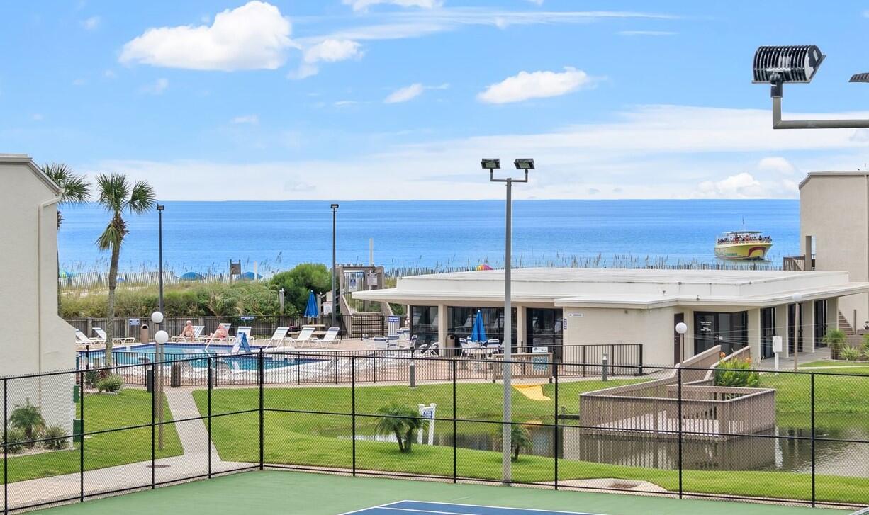 LOWEST PRICED GULF VIEW 2 BED / 2 BATH CONDO IN PCB!!!

Investors DREAM! Check out the ROI numbers below!

Sugar Beach is a treasured community where time stands still and lifelong memories are made with family and friends!

The serene gulf views from the Master Bedroom, Living Room, Dining Room, and Balcony are truly awe inspiring, and the world-renowned action of Thomas Drive can easily be experienced from your 3rd floor front balcony.

2 bed/2 bath condos in Sugar Beach are true rental machines, and this one is sure to be no exception. Both bathrooms boast beautiful dark accent granite countertops, new vanities ready to be installed (if desired), and the designer tile flooring in all rooms (except bedrooms) are perfect for ensuring the unit is always ready made for beach going renters. The owners love the relaxing coastal decor and laid back "beachy" vibes, but understand that the new owners will have exciting ideas on how they will customize it to match their vision of paradise. The list price was thoughtfully determined to ensure the new owners have ample opportunity to make it the perfect home for themselves - while still ensuring that it is an incredible investment that pays dividends for years to come!

Choose one, or choose all... Here are some estimated potential upgrade costs:

1. LVP Flooring through entire condo: $4,000
2. Stainless Fridge: $700
3. Stainless Stove: $700
4. Stainless Dishwasher: $400
5. 2 Panel Door Replacements for bedrooms and bathrooms: $400
6. Remove Wallpaper and Paint Entire Condo: $1,600
7. Custom tile shower, new toilet, remove drop panel ceiling, install new vanity/lights/fixtures in master bathroom: $5,000
8. New shower door, new toilet, new vanity/fixtures, remove wallpaper and paint: $3,000
9. New Bedroom and Patio Furniture: $5,000

TOTAL FOR A BRAND NEW CUSTOM INTERIOR: $20,800

Brand new hurricane windows were just installed 2 months ago ($4k).

The unit comes fully furnished and is rental ready, but should you choose to redo everything listed above, you are only $409,800 invested, everything is new and exactly as you like it, and you are still $20k lower than the next comparable condo for sale, and your unit is comparable to condo immediately next door that has brought in $81k in rentals this year!. 

At these numbers... your annual ROI is well over 30% - which is unheard of nowadays!

Now you can see... this one is a steal at this price!!!

Sugar Beach has everything you could ask for to ensure enormous rental income. It is one of the few remaining pet friendly vacation destinations in PCB - which is a HUGE amenity for renters (giving you a truly competitive advantage). Gated community, no elevators, park directly at your door, private gated beach access, pool, tennis, shuffleboard, grilling area, huge koi/turtle pond right out your back door, countless nearby restaurants/activities, and the list goes on!

Banks offer less than a 1% annual ROI, and stocks and crypto values have been declining. On a financed purchase, enjoy an UNBELIEVABLE 4-36% annual ROI with this amazing investment opportunity! (% is fully dependent on owner's rental approach)

Welcome home to Paradise!!!

*Low quarterly HOA Fees include water, trash, cable, exterior insurance, grounds keeping, 24 hour video surveillance, community amenities (pool, tennis court x 2, shuffleboard, Koi pond, community room/kitchen, ping pong), on site maintenance 8 hours daily, onsite property management Mon-Fri, and private gated beach access.

*Measurements are approximate, buyer to verify if needed*