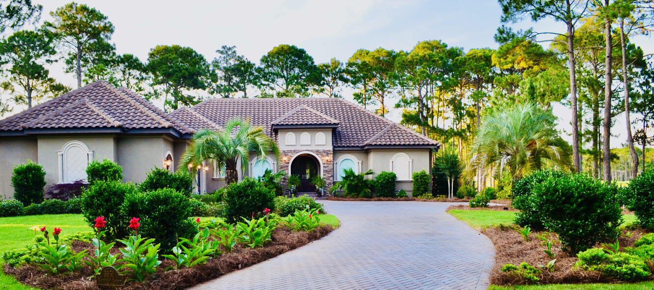 One Level 2014 3bdrm w/office custom Mediterranean inspired home by Compass builders. Home sits on an exceptional picturesque half acre lot with room for a pool. Steps away from the Raven Golf Course located between holes 14 & 15. Across the street from Island Green hole 6 & lake w/cascading fountain which can be viewed from the stunning mahogany front double doors & front facing windows w/plantation shutters. Open floor plan with coffered ceilings in the kitchen, dining room, & family room. Cooking enthusiasts, this kitchen is sure to please, prep your meals on the expansive island w/granite countertops. Plenty of cabinets along with a generous size pantry to satisfy storage needs.  Appliances include gas range top, double ovens, a new refrigerator & new dishwasher both under warranty. Offers plenty of room for entertaining and hosting your favorite dinner parties. 3 Bedrooms w/ensuite, crown molding & fans. Owner's suite enjoys golf course views. Owner's ensuite includes a spacious walk-through shower and a luxurious free standing garden tub to soak your cares away. 2- 1/2 car oversized garage with enough room to tackle your projects and bonus a large open storage space above. New washer & dryer under warranty. From the screened lanai which is piped for a gas grill, relax and revel in the natural beauty of the surrounding golf course and the distant lake views. Built-in home audio system which provides your favorite music throughout the home. Security System with motion detectors and night vision enabled cameras. Irrigation system w/new pump supplements the beautifully landscaped property with bushes, flowers, and fruit trees.  Cool off or sunbathe with your choice between 2 community pools- (heated & included in the HOA fees) 
Paradise is found here with only a short golf cart ride to the gorgeous emerald coast beaches, Grand Blvd shopping, and Village of Baytowne Wharf- a family friendly event plaza surrounded by boutiques, the adventure zone for children, restaurants, night life for the adults, and a fishing pier over the Choctawhatchee Bay. Previous events have included wine festivals, parades, concerts, fireworks, ice-skating, fly-board over the lagoon, movies on the lawn and more..   4 Championship Golf Courses, Tennis Center w/15 courts, fitness center, 266 slip marina, fishing, biking, and glorious bay & beach sunsets are waiting for you tucked inside the manicured gates of Sandestin Golf & Beach Resort. 

*Sandestin Owner's Association dues $405.05 Quarterly and Baytowne Neighborhood Association $380.00 Annually.   **SOA Capital Contribution of .5% to be included as a buyer's expense on all offers submitted.