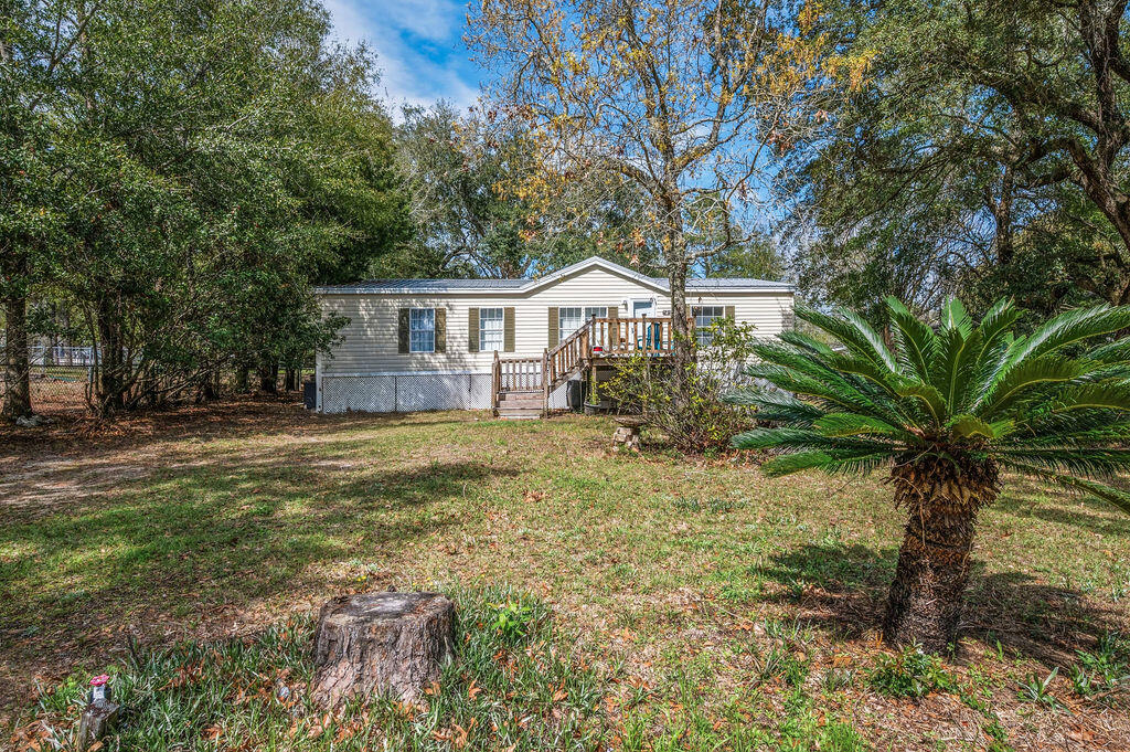 Live near the bay without the bay-front price! This updated 3 bedroom, 2 bathroom manufactured home is located just Â½ mile from beautiful Choctawhatchee Bay, offering easy access to boating, fishing, and coastal living. Conveniently located 3 miles from the Mid-Bay Bridge, 10.9 miles to the Emerald Coast beaches, & 18 miles to Eglin Air Force Base. Major updates include a METAL ROOF, HVAC, Flooring, Dishwasher, & Kitchen Cabinets all replaced in 2020. The Water Heater replaced in 2022. Fully repainted in 2026. The property offers dual access with the front entry from Beech St & backyard access from Willow, plus RV hookups with 30amp electric, water, and sewer already in place. Work shed is also included. A great opportunity for a primary home, vacation getaway, or investment near the water