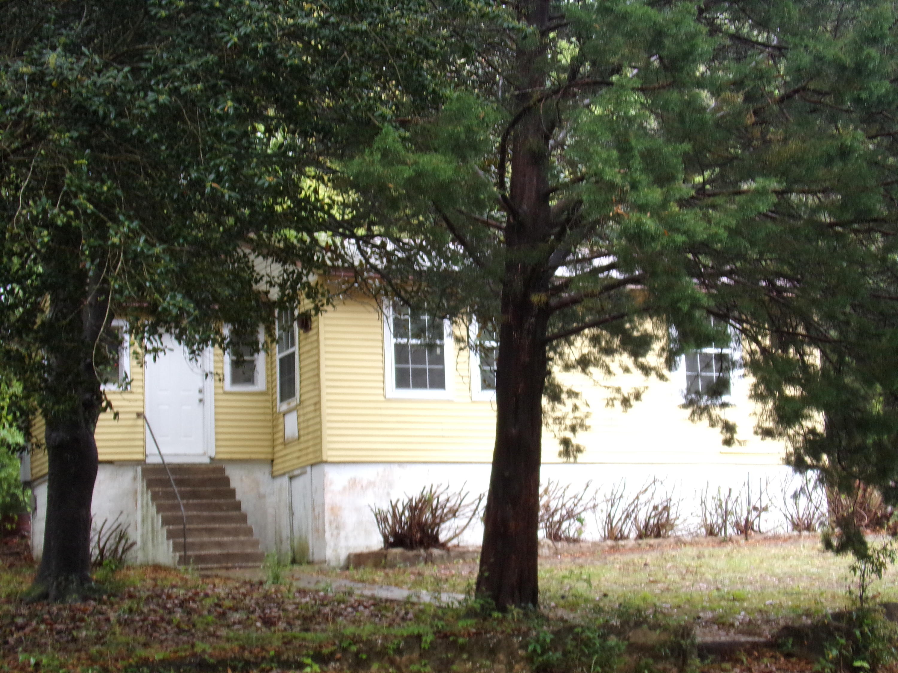 Adorable home that would be great for a starter home~ 2 bedroom, 1 bath in town just down the street from Northwood Elementary~ New refrigerator, range & microwave~ Metal roof installed in 2012~ This would make a great starter home or investment/rental property~ Being sold ''As Is''