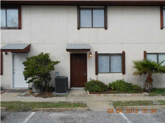 Just listed. Located just off Airport Rd. Mexican tile flooring downstairs for easy care. Carpet in bedrooms. Back yard has pavers and great for entertaining and low maintainence. Close to beaches and shopping. All new appliances with washer and dryer and new countertops. And new a/c. NO PETS!!!!! .