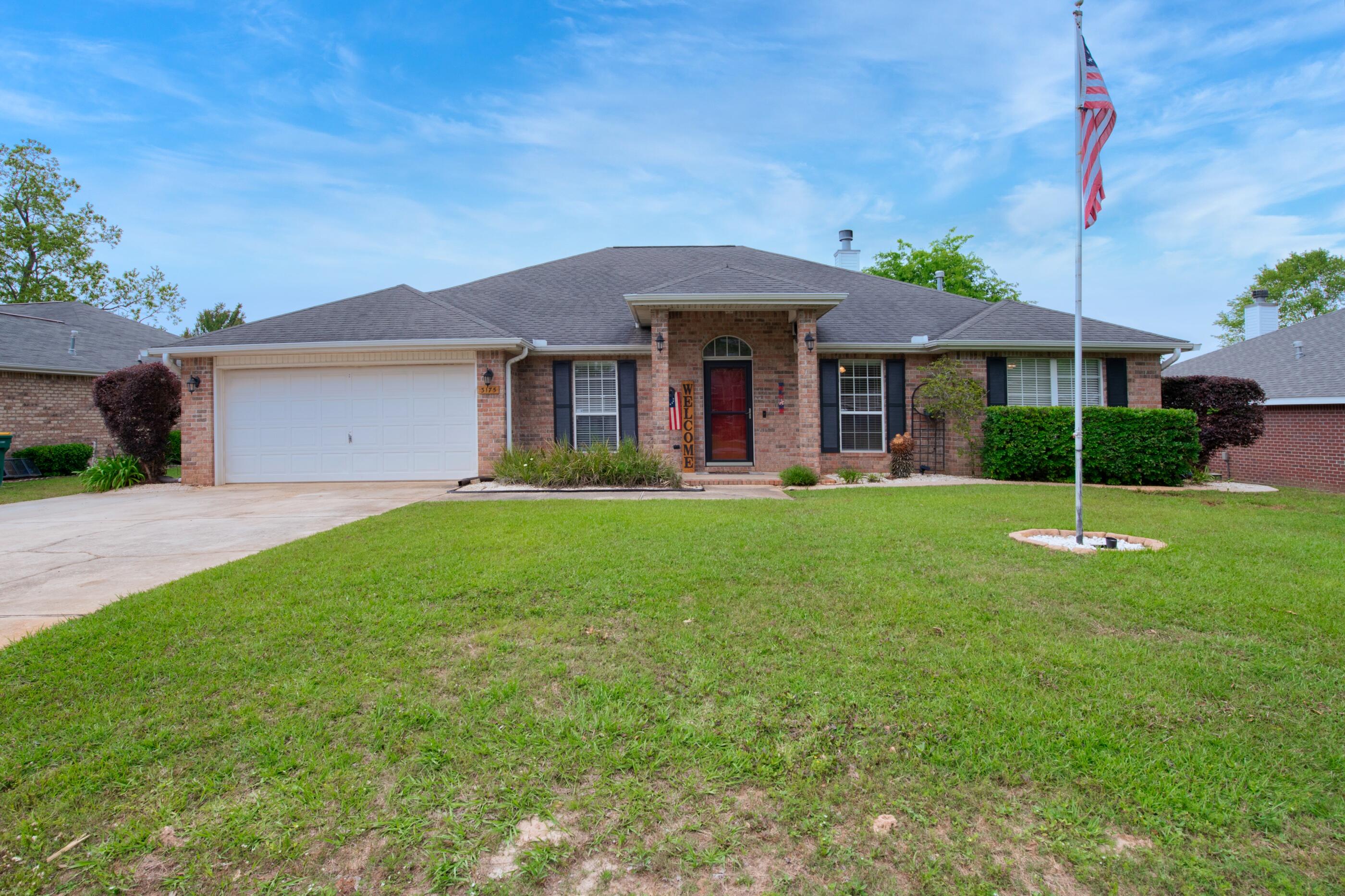 There is nothing standard about this home! The seller has installed extensive upgrades which make it a cut above others in it's class! Beautiful hardwood bamboo flooring has been installed in all rooms except two of the baths which have tile. Granite counter tops and stainless steel appliances in the kitchen. The master bath features a garden tub with whirlpool and a separate walk-in shower. The walk-in closet in the master bath has built-in drawers, shoe racks, you name it (see the photo!). The cabinets in the master bath were specially designed and feature roll out drawers and tons of storage. Special built-in shelves and cabinets in the family room are such a nice touch along with the gas log fireplace. The home's design features a double split with the master bedroom on one side of the home and two bedrooms together with a bath on the other side and then split again on the other side is a guest bedroom and bath with door to the back lanai. There is a formal dining room and a formal living room which could double as a study that are separated by the large foyer. Informal dining area is located off of the kitchen and adjoins the family room. As if that weren't enough, there is an 18x36 SPARKLING IN GROUND CAGED POOL with a heater and a slide located in the large privacy fenced back yard. A really nice fenced dog kennel has been built as well as a fire pit area with stone pavers outside of the pool enclosure. Nice sized indoor laundry room and double car garage with auto remote opener. Great home! Great value for the price! Outside city limits so NO CITY TAXES!!!