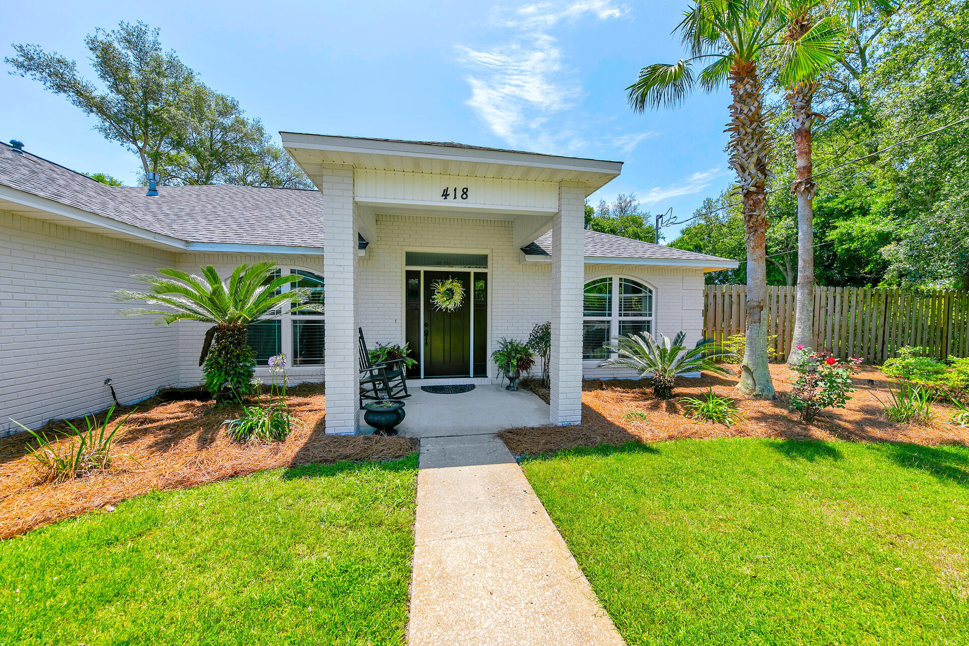 This beautiful (freshly painted exterior) brick home has been meticulously maintained and updated throughout. Open floor plan with a large master bedroom. Stainless steel appliances in the kitchen with quartz countertops.
Looking for your own private oasis? This backyard is great for entertaining large and small crowds with a covered patio, gunite pool with sundeck and a water feature, firepit and 10 ft. fence surrounding backyard.  Perfect backyard for relaxing and watching your favorite sports games.