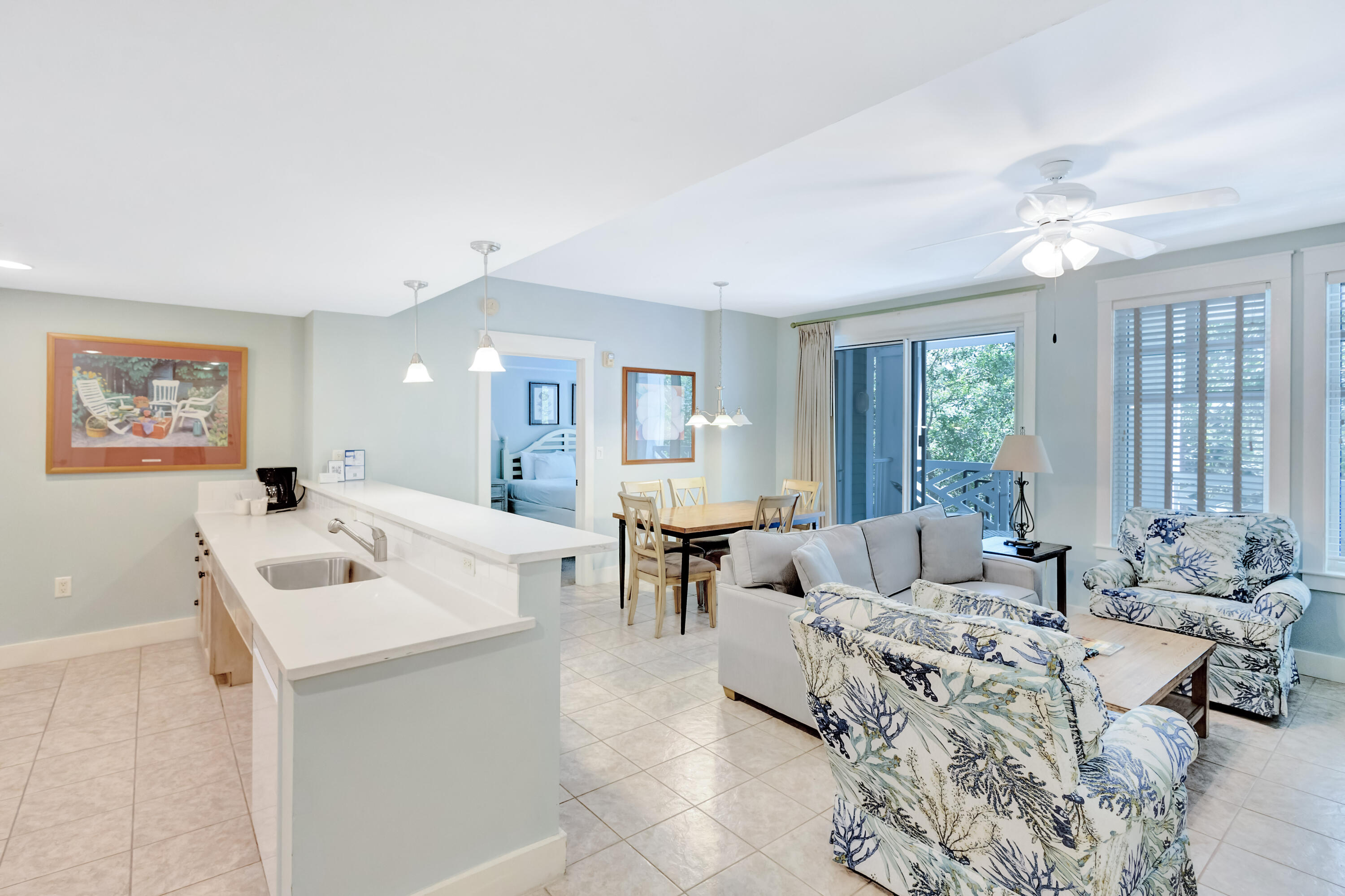 Discover the perfect blend of use, accessibility and location in this lock-off style residence in Pilot House. This floor plan affords you multiple ways to capture rental income (a studio with double queen beds, a 2bedroom or as a full 3bedroom). Conveniently located on the 3rd floor with direct egress to the amenity terrace hosting a resort style pool, grills, fitness center, gardens and fireplace pavilion. This condo is ADA-compliant featuring a roll-in shower, easily accessible sinks and safety handlebars. The living room has been refreshed with new furnishings, including a sleeper sofa, and the kitchen and baths have sleek white granite counters. Step outside to the spacious 27ft covered balcony, accessible from the primary & guest bedroom as well as the living area. Pilot House is part of the Gateway community integrated into the Village of Baytowne Wharf, a pedestrian village which hosts seasonal fireworks shows, dining, family friendly activities and playground, shopping, concerts and more.

As an introduction to the Sandestin lifestyle, we invite our new owners to explore amenities that make Sandestin special. The listing brokerage and seller(s) are presenting the buyer(s) of this property with (2) 90-minute rounds of Tennis court time, a golf foursome at one of our three championship courses, and a round of golf for up to four (4) players at the unrivaled Burnt Pine Golf Club.

Sandestin Golf and Beach Resort features more than seven miles of beaches and pristine bay front, four championship golf courses, 15 world-class tennis courts, a 226-slip marina, a fitness center, spa and celebrity chef dining. Shop, dine and play at the charming pedestrian village, The Village of Baytowne Wharf and more. Inside the gates of the resort, residents enjoy a balanced lifestyle of high-class living, spanning the 2,400 acres from the beach to the bay. Everything within the gates of the resort is accessible by golf cart or bicycle. The entire resort is interconnected by miles of pedestrian, bike and golf cart paths that weave through groves of live oaks, meandering past natural lagoons, fountains, man-made lakes, and meticulously landscaped fairways.