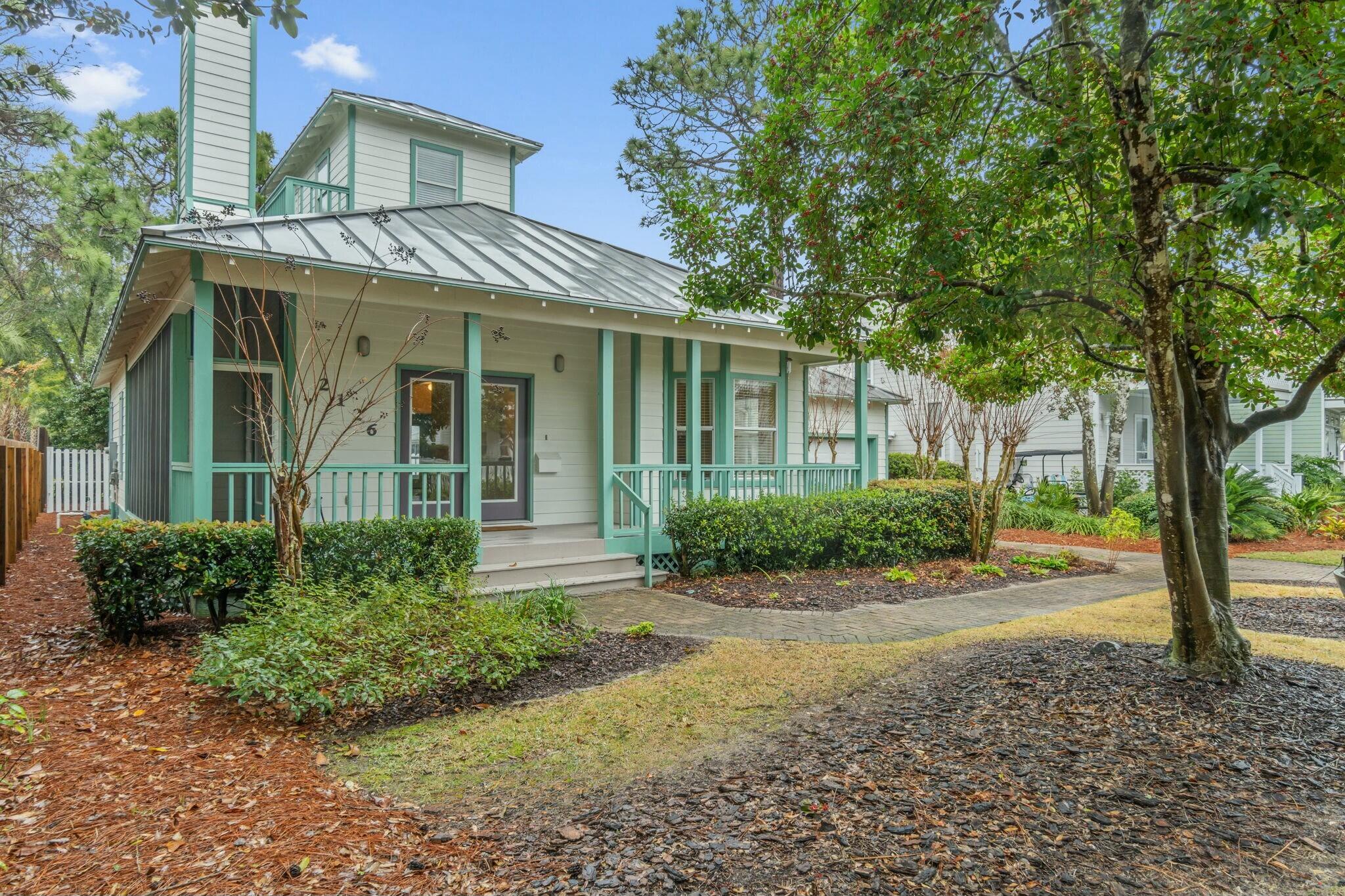 NEW METAL ROOF INSTALLED MAY 2025! Incredible opportunity to own in the picturesque Crystal Lake community of the renowned Sandestin Golf and Beach Resort! Located at the end of a cul-de-sac, this delightful home offers great curb appeal with its charming picket fence lined yard, brick paver driveway/walkway and sizable front yard complete with lush landscaping. The inviting front porch is a great spot to relax and enjoy the tranquil surroundings. Functional open concept living/kitchen/dining area is perfect for entertaining. Living room boasts beautiful hardwood floors and a cozy fireplace with exterior doors on either side which leads to screened in area. Large island in kitchen with spacious cabinets and pantry. Dining area highlights bay windows beaming with natural light. Master bedroom on first floor with en suite bath which includes double vanity, updated shower and linen closet. Additional bedroom on first floor with exterior door access to the backyard. Second full bathroom on the first floor is convenient for guests. Take the spiral staircase to the second floor which showcases a vaulted wood ceiling, bright windows and a separate storage area. This flex space offers many potential options - 3rd bedroom, office, den, exercise room or art studio. Upstairs area also has outdoor access to balcony overlooking the quaint community. Attached one-car garage offers additional convenience and easy access to utility room. Exceptional price presents endless possibilities to put your own unique touch on this property. Sandestin Resort is a 2,400 acre destination along Florida's magnificent Emerald Coast offering many outdoor recreational activities, boutique shops, restaurants and vibrant nightlife.
