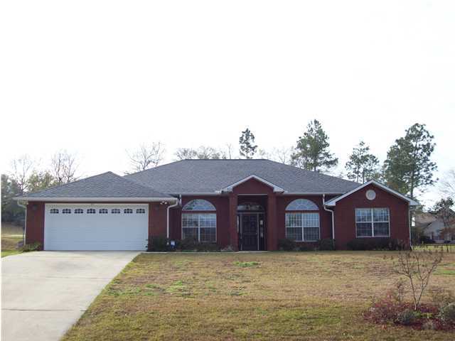 THIS HOME IS FULL OF HIGH QUALITY UPGRADES SUCH AS SOLID SURFACE COUNTERTOPS, CHERRY CABINETRY, TILED FLOORS, ROUNDED SHEET ROCK CORNERS,VAULTED GREAT ROOM AND OTHER RAISED CEILINGS, A FORMAL DINING ROOM AND LARGE OFFICE AT THE ENTRY AREA,CULTURED MARBLE IN BOTH BATHROOMS. THE MASTER BEDROOM HAS TREYED CEILINGS, OUTSIDE ACCESS, HIS & HERS WALK-IN CLOSETS, CULTURED MARBLE JACUZZI TUB, WALK-IN SHOWER AND DOUBLE VANITIES. BEDROOMS NUMBER 2 & 3 IN THIS SPLIT BEDROOM FLOOR PLAN ARE LARGE AND VERY ROOMY.(NOTE ROOM SIZES). THE EXTERIOR IS FULLY BRICKED.