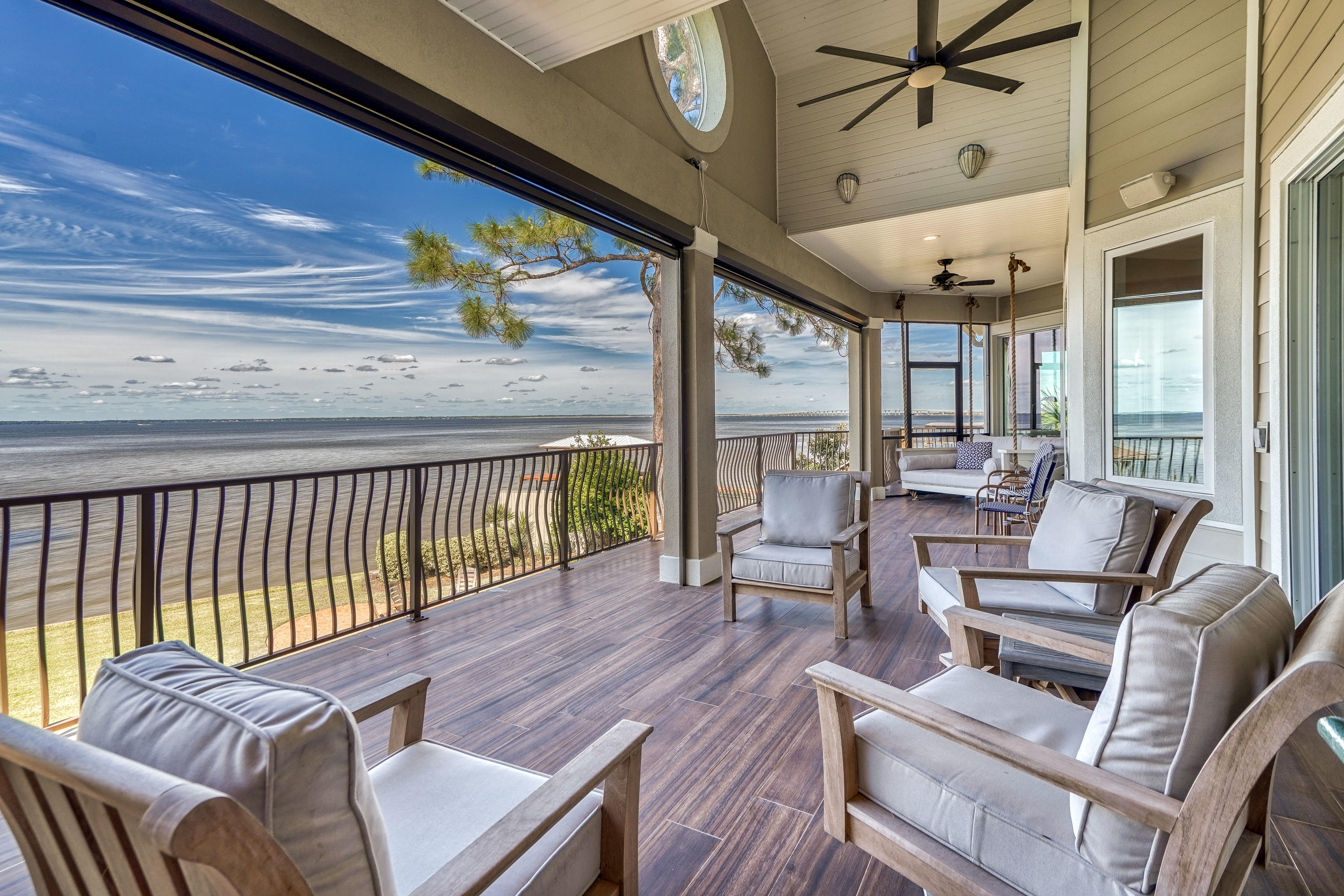 Bay Front Compound 5 mins from 30A beaches. Right at -1/2 acre w/ 100 waterfront feet directly on Choctawhatchee Bay (Big Water). 8 ft privacy fence surrounds perimeter of the property w/gated entrance to your waterfront oasis. Heated pool, hot tub, pool deck, and outdoor pavilion custom built in 2011 creating a private paradise just minutes from the beautiful South Walton Beaches. 5 bedrooms, 3 1/2 bathrooms, a formal living room on the second level overlooking the bay, a large bonus living room on the ground level, and plenty of storage. 3 car over sized garage. Features incl elevator shaft, NEW kitchen, Remote retractable screen porch, All new solid surface flooring, brand new dock and boat lift for large boat, Elegant yet comfy bay living at its finest. Back yard is your playground Buyer to verify dimensions
The ultimate bay house for living the dream 
2018 Sea Fox Avenger could be purchased separately
Furnishings could be purchased seperately
Perfectly designed for family FUN
