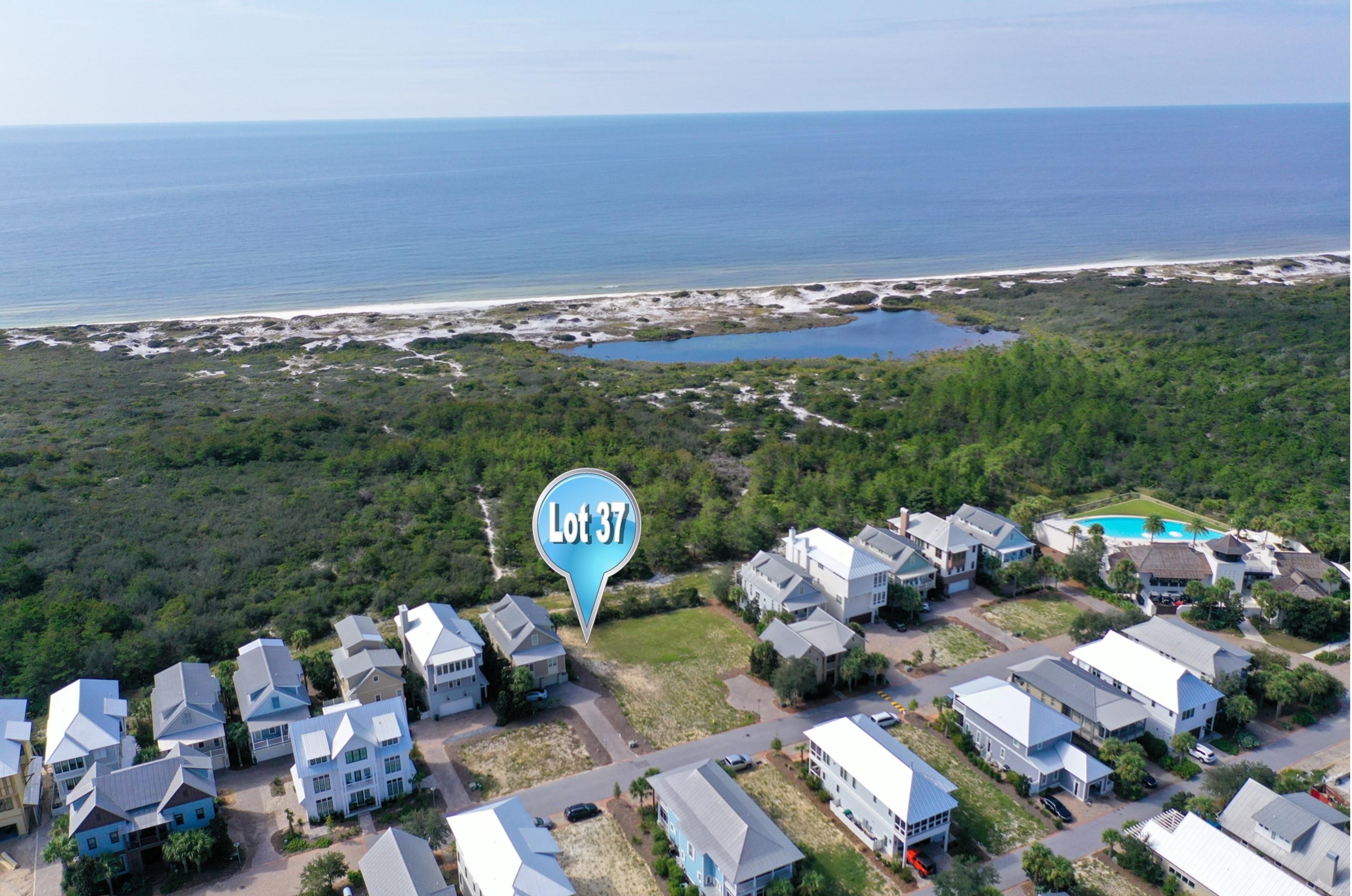 Welcome home to Cypress Dunes! This front row home-site is located in the gated community of Cypress Dunes and overlooks Topsail Hill Nature Preserve with amazing views of the Gulf of Mexico and state forest.  Now is a great time to secure your front row location in Cypress Dunes and build your Beach Cottage so you can enjoy the incredible gulf breeze and stunning views. ~Cypress Dunes is a luxury resort community tucked away on Scenic Highway 30A! Conveniently located at the West end of 30A and just minutes from the beach, shopping, entertainment, dining and more! Cypress Dunes subdivision consists of 44 acres situated 25 feet above sea level and is in an ''X'' flood zone. Cypress Dunes is known for its landscaping of native plants, a 200 year old Cypress Head, state of the art amenity center, and breathtaking views of a Coastal Dune Lake and the Gulf of Mexico! Completely surrounded by Topsail Hill State Preserve so the views are unobstructed! Topsail Hill State Park offers 3.2 miles of secluded white sandy beaches, kid activities, nature trails, camp sites and a tram to the beach! The Cypress Dunes amenity center boasts an infinity edged pool, hot tub, workout facility, outdoor covered fireplace, 2nd level sunset deck, and an owners party room with a commercial kitchen, all overlooking the Gulf of Mexico! 
~Other amenities include a 2nd pool in Phase 2, boardwalks through the Cypress Pond, tennis courts, and a plush lawn area for recreational use!