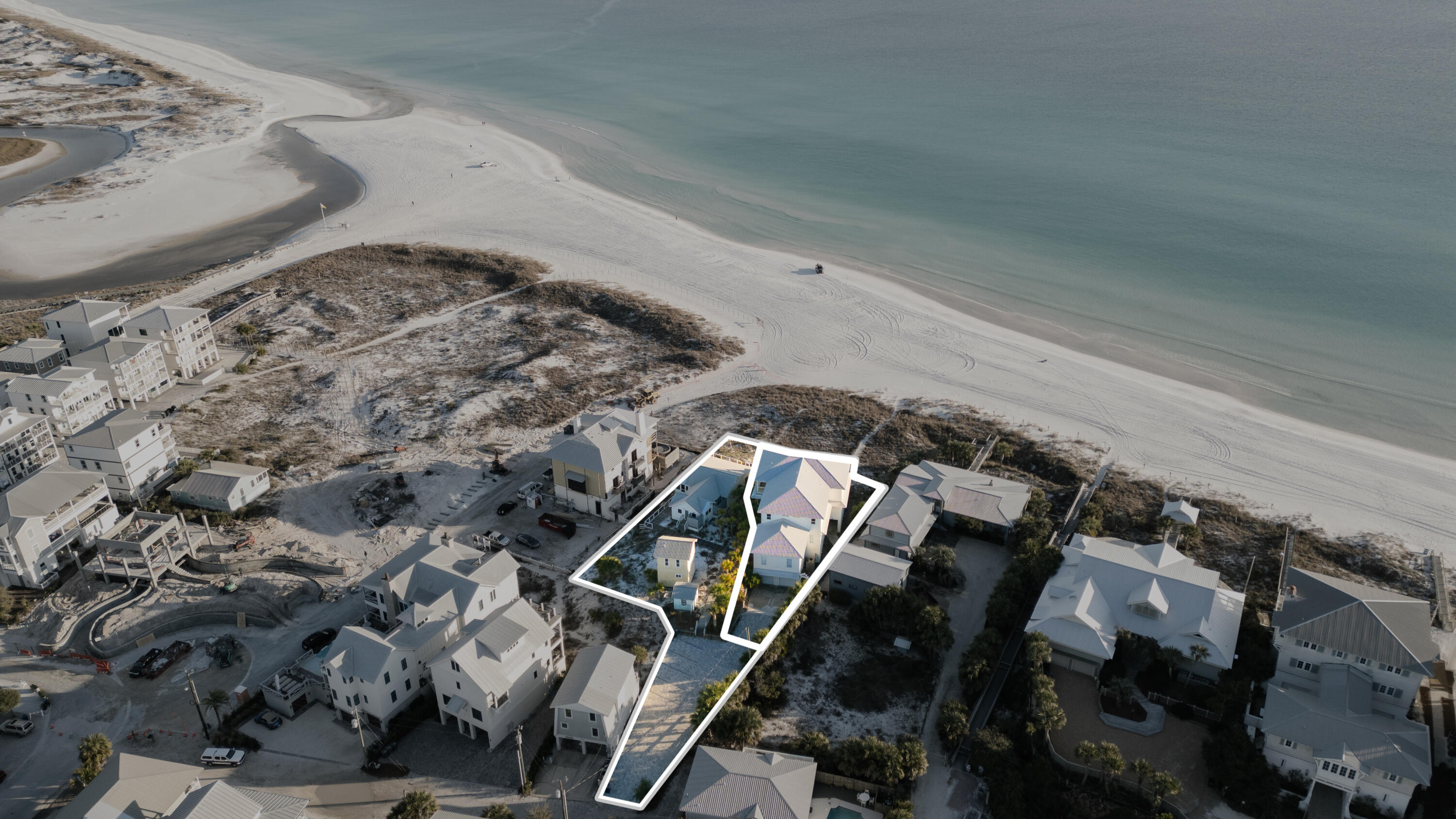 Two Adjacent Gulf-Front Properties Offered Together in Coveted Grayton Beach!!!

Along the sugar-white sands of Grayton Beach—where the Gulf has kept its quiet vigil for generations—an exceptionally rare Old Florida estate awaits. Offered together, these two Gulf-front lots span more than 120 feet along the shoreline and encompass nearly half an acre of treasured coastal ground. Tucked at the end of a sleepy lane, with no pass-through traffic to disturb the moment, the setting provides a level of privacy seldom found on the Gulf today.

The easternmost parcel, 8 Hotz Avenue, is home to an authentic 1935 Gulf cottage, relocated to this site in the early 1950s. Lovingly preserved and thoughtfully maintained by the same family for decades, the cottage stands as a tangible piece of ... Grayton's history. This original home is a charming three-bedroom cottage featuring a full bathroom and two half-baths, each equipped with its own outdoor shower. A cozy kitchen connects to a living and dining area that opens up to a spacious porch, extending across the south and most of the east facade of the cottage. This porch provides one of the most picturesque views along the Gulf coast. To step onto this property is to experience Grayton as it wasunpolished, welcoming, and rich with story.

The westernmost parcel, 2 Hotz Avenue, hosts the main residence: a legacy three-story Gulf-front home designed for effortless living and joyful gathering. From every level, sweeping views extend across Grayton's iconic beaches to the ever-changing waters beyond. The home features seven bedrooms, six full baths, and two half baths, generously arranged for comfort and privacy. Deep, wraparound porches span both the second and third floors, inviting morning coffee, lingering conversations, and sunsets carried in on steady Gulf breezes. A brick-paved drive leads to an expansive garage of nearly 2,000 square feetample space for six or more vehicles, a workshop, a boat trailer, or whatever pursuits the day inspires.

Together, these two properties present a once-in-a-generation opportunity to create a family estate unlike any other. The views are unmatched, the history is genuine, and the barefoot way of life that comes with it is something to be felt, not explained. Grayton Beach is beloved for its unspoiled beauty, enduring artistic spirit, and a pace of life that favors grace over hurrywhat The New York Times aptly describes as "upscale, but unfussy."

Being sold fully furnished AS IS with a few exclusions of personal importance.