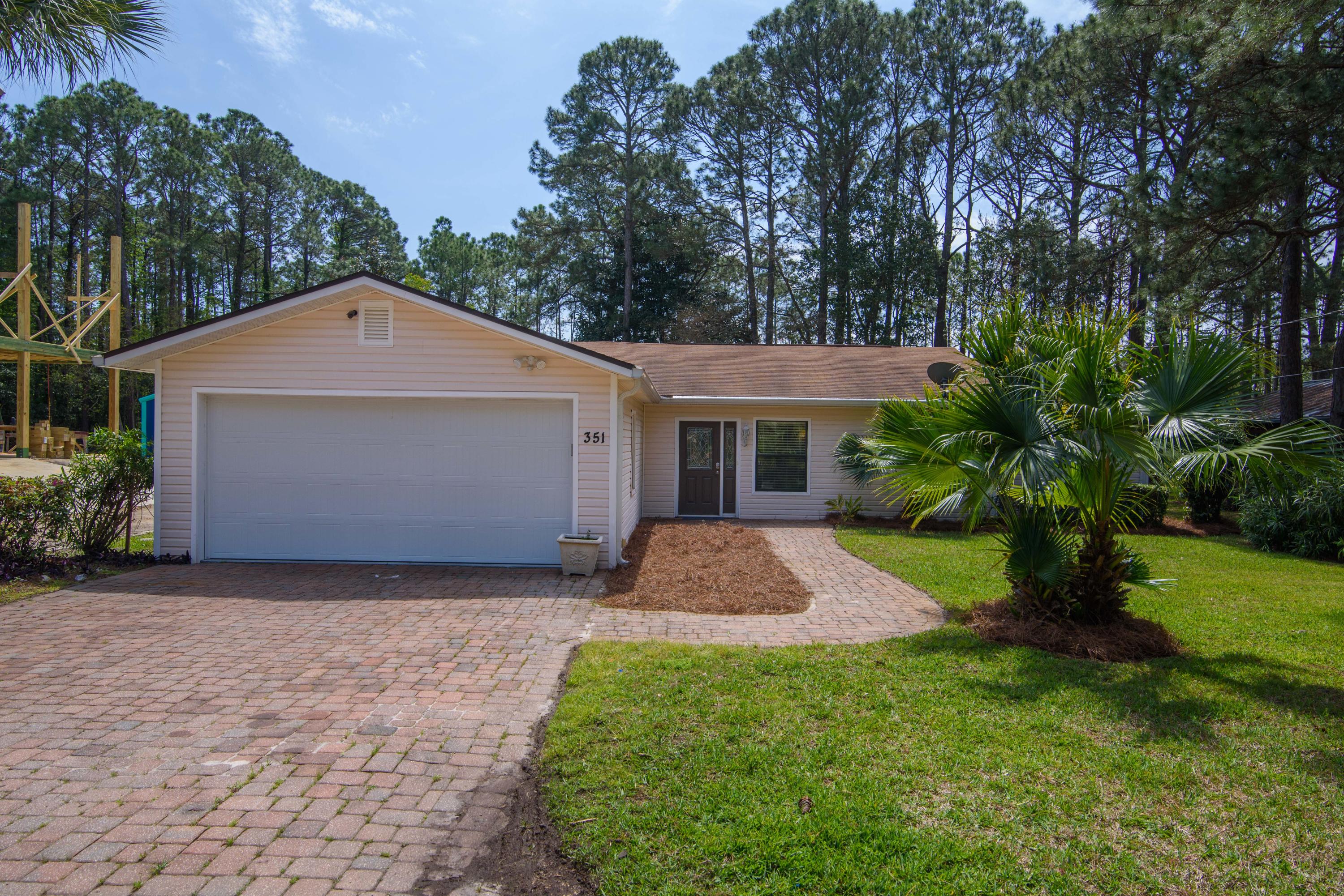 Move in ready. Renovated large home with guest cottage NEW ROOF, NEW HVAC summer of 2021  Home renovated in October 2020. Must see. 4 bedroom 3 bath home with 2200 sq.ft. with screened in porch and full size garage and large yard with fence along fresh water canal in Miramar Beach. Guest Cottage of 636 sq ft has 1 bedroom, 1 bath and kitchen. See pictures and virtual tours- its a perfect view . New appliances in kitchen, new flooring, paint, bathrooms updated. See virtual tour for perfect walk thru of property. New Hot water Heater installed in guest cottage Jan 2022.