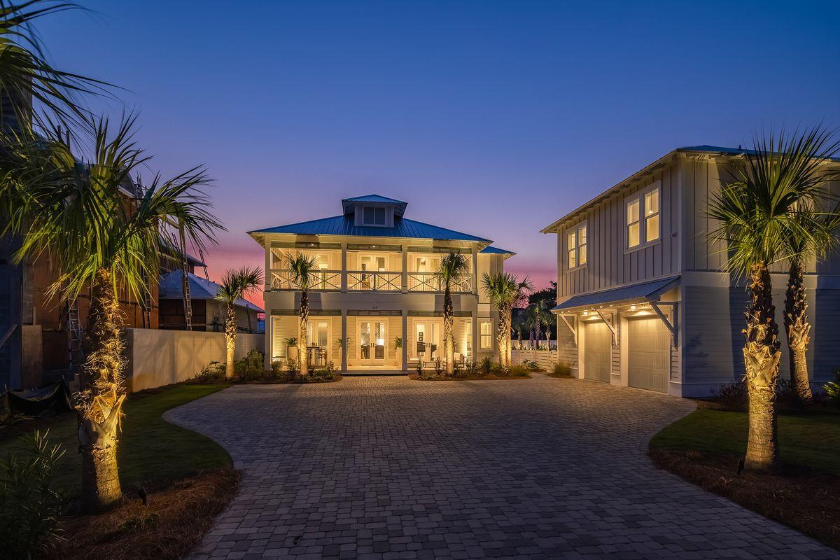Artful coastal design juxtaposed expansive indoor and outdoor living spaces characterize this exceptional beachside retreat which is primely situated on an oversized .31 acre homesite centrally located on the coveted east end of 30A providing deeded beach access as well as walking/biking distance to Alys Beach, Kaiya and Rosemary Beach. Masterfully built and thoughtfully designed, this six bedroom home has been impeccably maintained featuring notable architectural elements including 1,100 sqft of covered & screened porches as well as a spacious detached carriage house complete with a private kitchen, full bathroom and sizable sleeping/living quarters. The main house has been recently styled with all new designer furnishings & chic lighting fixtures including selenite chandeliers and pendants in the dining room and kitchen. The first floor entry was designed to provide an impressive sense of arrival that yields an expansive open floor plan highlighted 10' ceilings as well as an abundance of windows for optimal natural lighting. The first level is anchored by a finely appointed chef's kitchen which features a massive walk-in pantry, sleek quartz countertops, stainless appliances including dual ovens, a 48" Thermador refrigerator and six burner gas range with griddle. The massive center island houses ample counter height seating as well as an oversized sink flanked by two stainless dishwashers and completely open to the adjoining living and dining areas which provides a fluid layout which is perfect for entertaining. The master retreat is located on the first floor and offers a spa-like master bathroom adjacent to the private laundry area and complete with a soaking tub, dual vanities, walk in-shower with suspended glass and a walk-in master closet with custom built-in storage. The indoor living space is perfectly complemented by an unparalleled outdoor living area including a screened outdoor lanai with full summer kitchen and grilling area overlooking lush manicured grounds and white peacock paver decking that surrounds the private resort style pool area. The second level is accessed by a beautiful staircase bathed in natural lighting from a double height wall of glass windows and providing easy access to four bedroom suites and a secondary living area. Each of the four bedroom suites feature immediate access to an ensuite bathroom as well as individual walk-in closets. Two of the suites provide access to a 13' deep covered outdoor lanai, perfect for enjoying the sounds of the nearby Gulf of Mexico. Other notable features include a secondary laundry area on the second floor, oversized two car garage with ample storage space, tankless hot water heaters for instant hot water and sophisticated engineered oak hardwood flooring throughout the first and second level. 

147 Brenda Lane would make an ideal primary, secondary or vacation rental property offering one of the rare secluded homesites on the east end of 30A while in exemplary proximity to iconic new urbanism communities, world class restaurants, boutique shopping, deeded beach access and premier golf courses that make South Walton County such a notable and renowned destination.