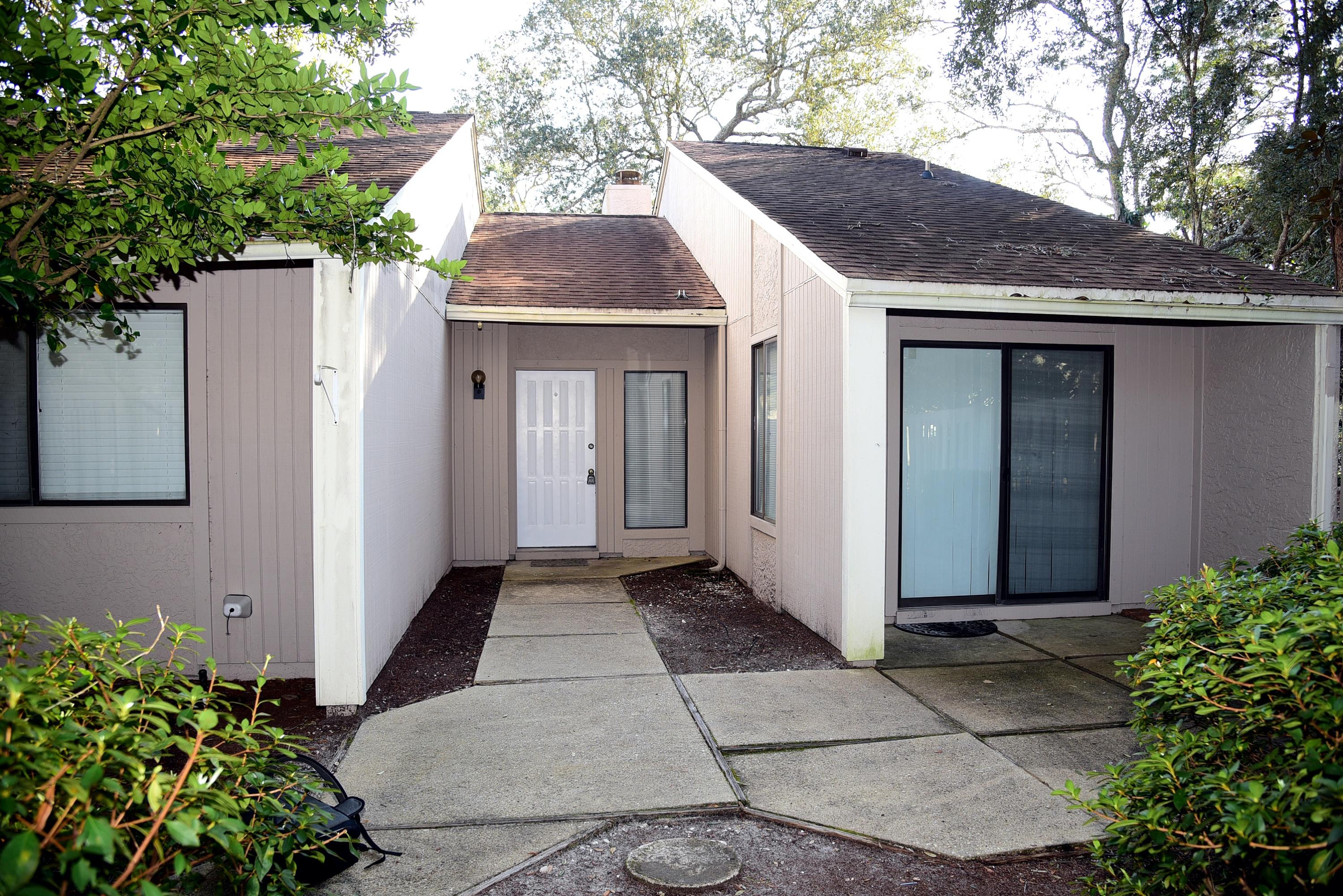 Highly sought after patio home in Bluewater Bay! The kitchen has a breakfast bar and opens to a breakfast area with sliding door to the enclosed patio. Master bedroom features an adjoining master bath, walk in closet and sliding door to another private patio.  Enjoy the wood burning fireplace in living room. HOA maintains property outside the patio area. Are you looking for low-maintenance living?  Call to schedule your appointment today!