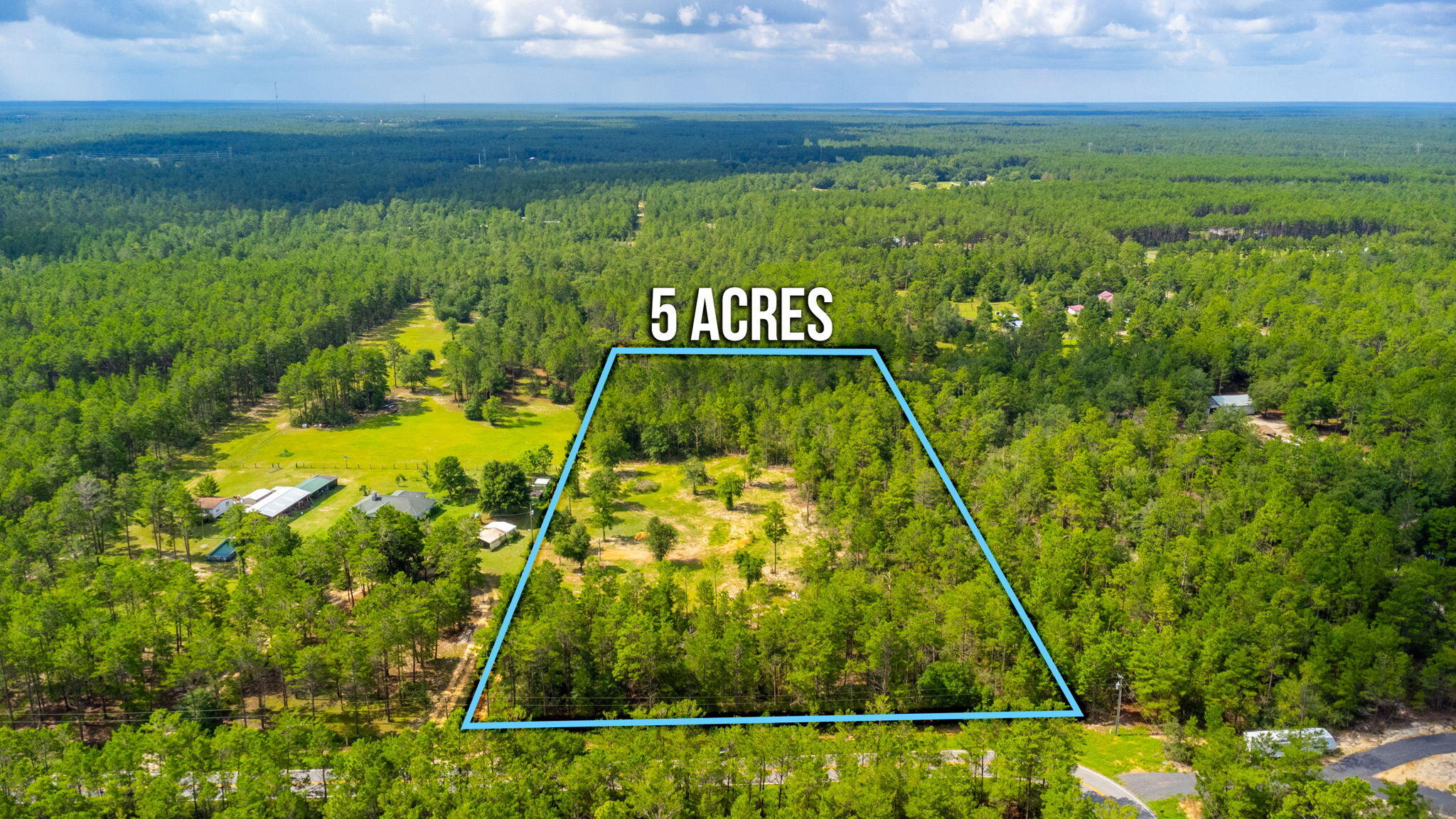 Peaceful and private living on this 5-acre tract of land located on a paved road! Electric is already available on this property. While the majority of the land is covered in trees and vegetation, the cleared portion offers a convenient starting point for construction or development while still maintaining the natural beauty of the surrounding wooded areas. 

Just one mile north of this property is the Shoal River which has public access for swimming and launching kayaks or paddleboards. The area is characterized by its natural beauty, with nearby lakes, rivers, and forests providing opportunities for outdoor activities such as fishing, hiking, and more! Located 24 minutes North of Niceville and just 18 minutes to Crestview.
