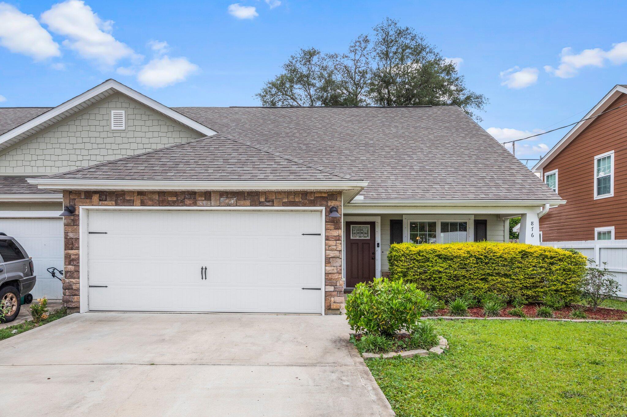 Welcome home to this absolutely stunning 5 bedroom, 2.5 bath craftsman style fully updated townhome located in the heart of Fort Walton Beach. This townhome is convenient to Eglin Air Force Base and Hurlburt Field! Pull up in the large driveway and appreciate the well cared for curb appeal, and after passing through the covered front patio you'll enter and love the large tile throughout the common areas. Enjoy a spacious living room open to the fully updated kitchen featuring stainless appliances, granite countertops, bronze fixtures, and pantry. You'll also find a separate eat in kitchen space and a conveniently located half bathroom downstairs. The primary bedroom is also located downstairs with the beautiful bathroom featuring matching granite dual vanities and bronze fixtures, a walk in closet, as well as a stand up shower and separate soaking tub to enjoy after a long day! Upstairs you'll find 4 great sized bedrooms with an additional full bathroom featuring double vanities! The interior laundry room is located downstairs leading to the two car garage. Outside you'll find your oversized fenced in backyard with a 22x6 covered lanai with plenty of room to enjoy! This property won't last long...Call for your showing today!! Owner will consider pets with restrictions. Any pet must be spayed/neutered, housebroken and current on all shots. Requires a non refundable pet fee. Tenants must carry renter's liability insurance.