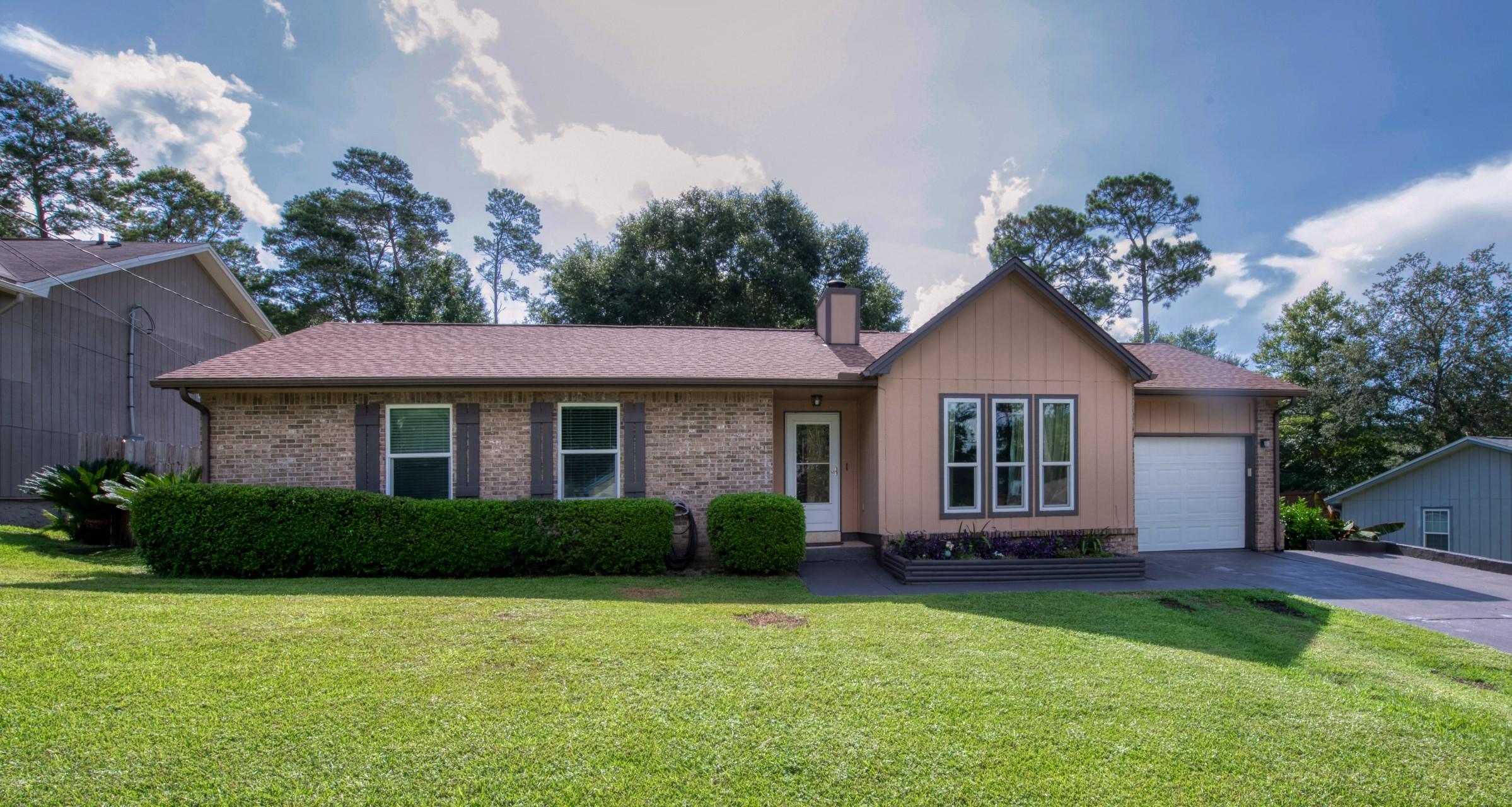 Price reduction! Fantastic Location in the Heart of Niceville. You need to see how this one LIVES! Superb Hurricane Rated Florida Room is heated and cooled and included in the home's MLS square footage. This room offers almost unlimited possibilities. At more than a quarter acre, the fantastic yard includes a fishpond, workshop and privacy fence; space that is just begging for a pool or in-law suite! Composite 21' by 12' deck overlooks lush grass. Separate living areas allow you great flexibility! Fresh paint and a sealed driveway make it move-in ready. Check out the Subway Tile in the hall bath, extra storage in the kitchen and garage! Practical layout with everything you need and nothing you don't!