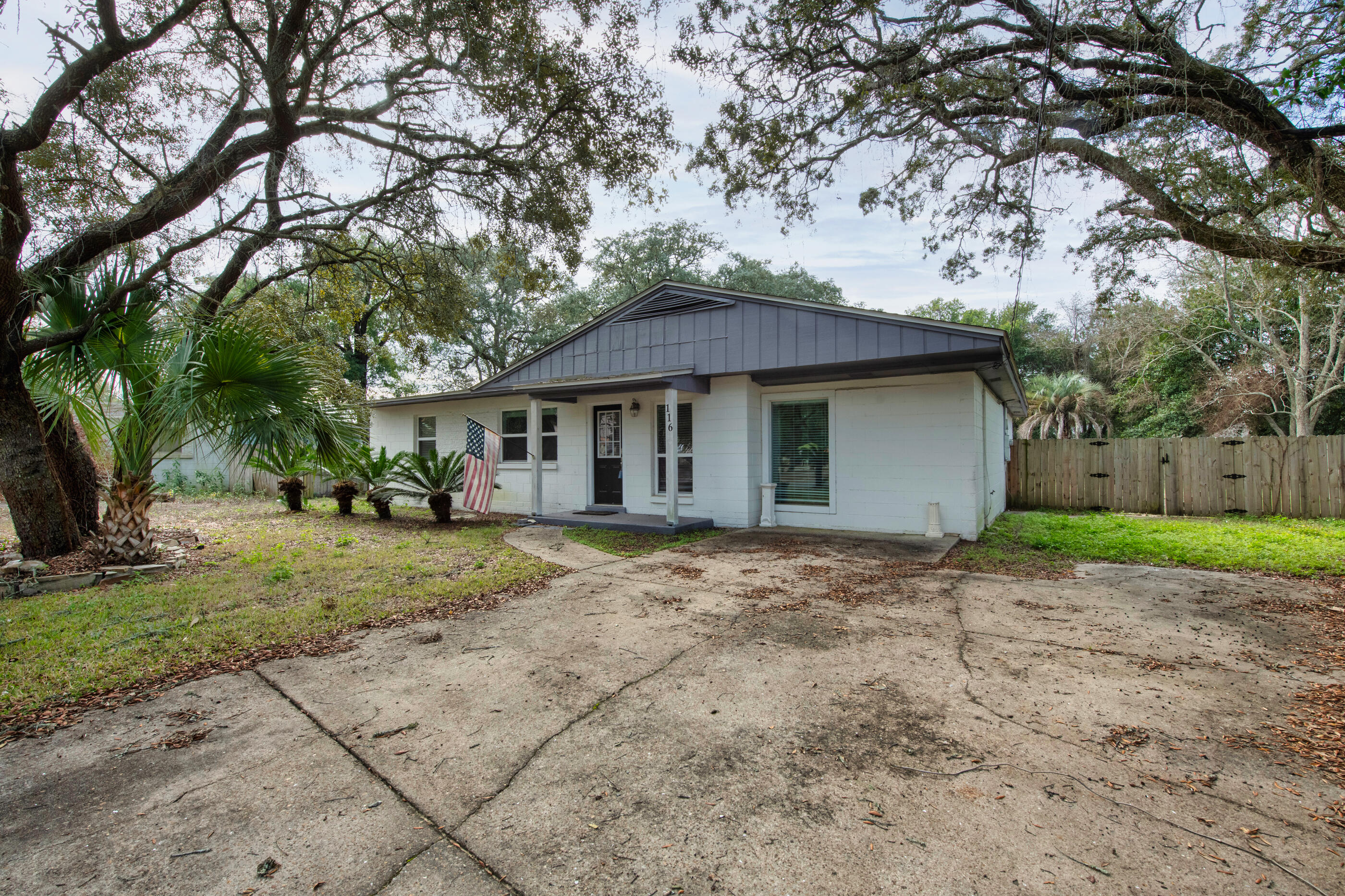 This beautifully updated 3-bedroom, 2.5-bath residence offers peace of mind with major upgrades already completed. In 2021, the home received new insulation, drywall, roof, HVAC system with updated ductwork, and copper electrical wiring. A high-efficiency tankless water heater was added in 2024 for endless hot water.

The interior features durable luxury vinyl plank flooring throughout the main living areas, with cozy carpeted bedrooms for added comfort. The open-concept kitchen is designed for everyday living and entertaining, showcasing crisp white shaker cabinetry and stainless steel appliances. Step outside to a fully enclosed backyard that provides privacy and plenty of room for future enhancementsincluding space to add a pool. Ideally situated near Fort Walton Beach's shoreline, dining, and shopping, this home combines convenience, updates, and freedom from HOA restrictions.