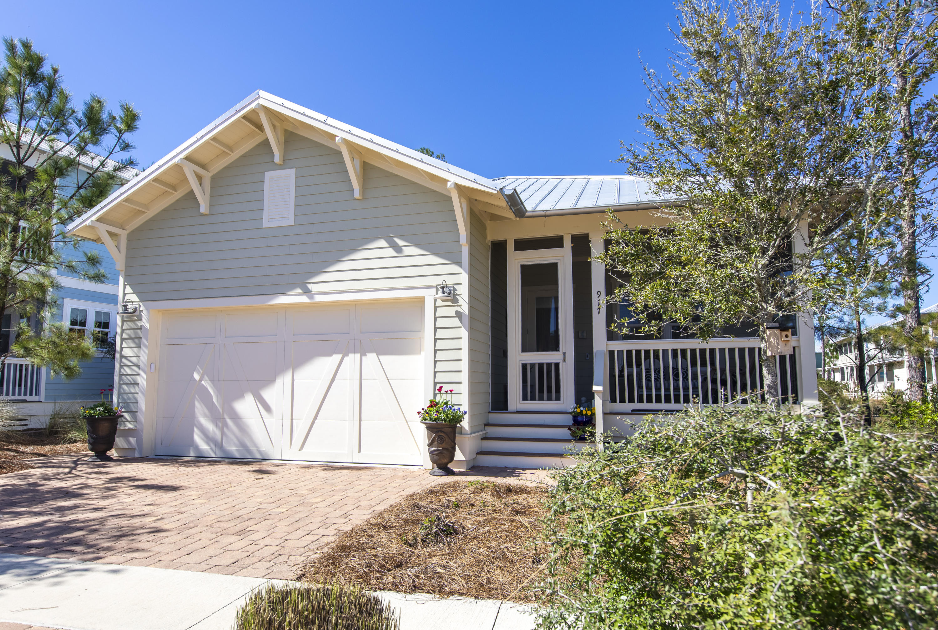NATUREWALK in Seagrove Beach...beautiful home has never been on the rental market. This 3 bedroom, 2.5 bath Beachwind plan is on one of the larger cottage home sites backing to preserve and has pond views. The floorplan features a large family room with fireplace and opens to a beautiful kitchen with breakfast bar. The kitchen finishes include Shrock quality cabinets with soft close drawers, granite countertops, tile backspash, stainless steel appliances including gas cooktop and GE monogram hood. The spacious master suite has tray ceilings, huge walk-in closet off the master bath, and glass walk-in tiled shower. You will love the screened in front porch and back porch which offers lots of privacy overlooking the preserve area and pond. Some of the many upgrades include: tankless water heater, window treatments, fenced back yard, Forever green lawn in the backyard, Screened-in back porch with doggie door, Screened in Front porch, Dual flood lights, Culligan water purifier system, Ring Door Bell and more! 
Community Gathering Place features:
Lap pool
Beach entry resort style pool
Toddler splash pool
Hot Tub
Outdoor grills
Fire Pit 
Other community features:
Volleyball court
Basketball court
Pickle Ball court
Playground
Walking trails
Minutes to shopping, dining, and entertainment