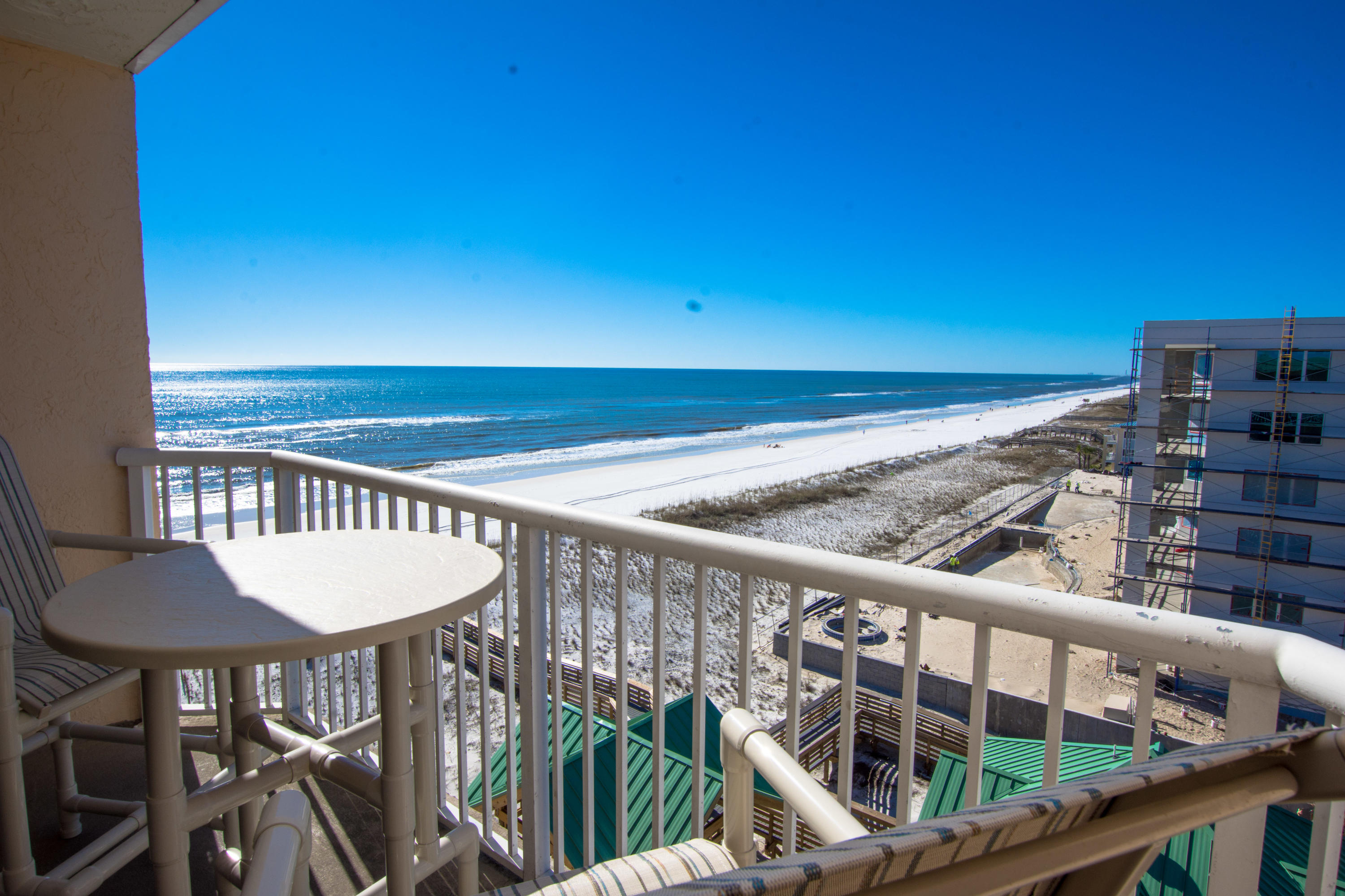 Enjoy an unlimited Coastline view from the 7th floor of this beautifully renovated studio condo. This rental income powerhouse produces more than $25,000 in annual income! The renovated kitchen features sleek white cabinetry, stainless steel appliances and a sea blue tile backsplash. The remodeled bathroom has a fully tiled walk-in shower. The condo boasts a king sized bed, sofa sleeper, desk/office, dining table and a large balcony with amazing Gulf views and breezes  the perfect location for viewing the sunset. The Islander Beach Resort offers a huge swimming pool, BBQ grills, picnic area, fitness center, meeting room, shuffle board, and dune walkover to the beach. This condo won't last long! *Buyer to verify all information*
