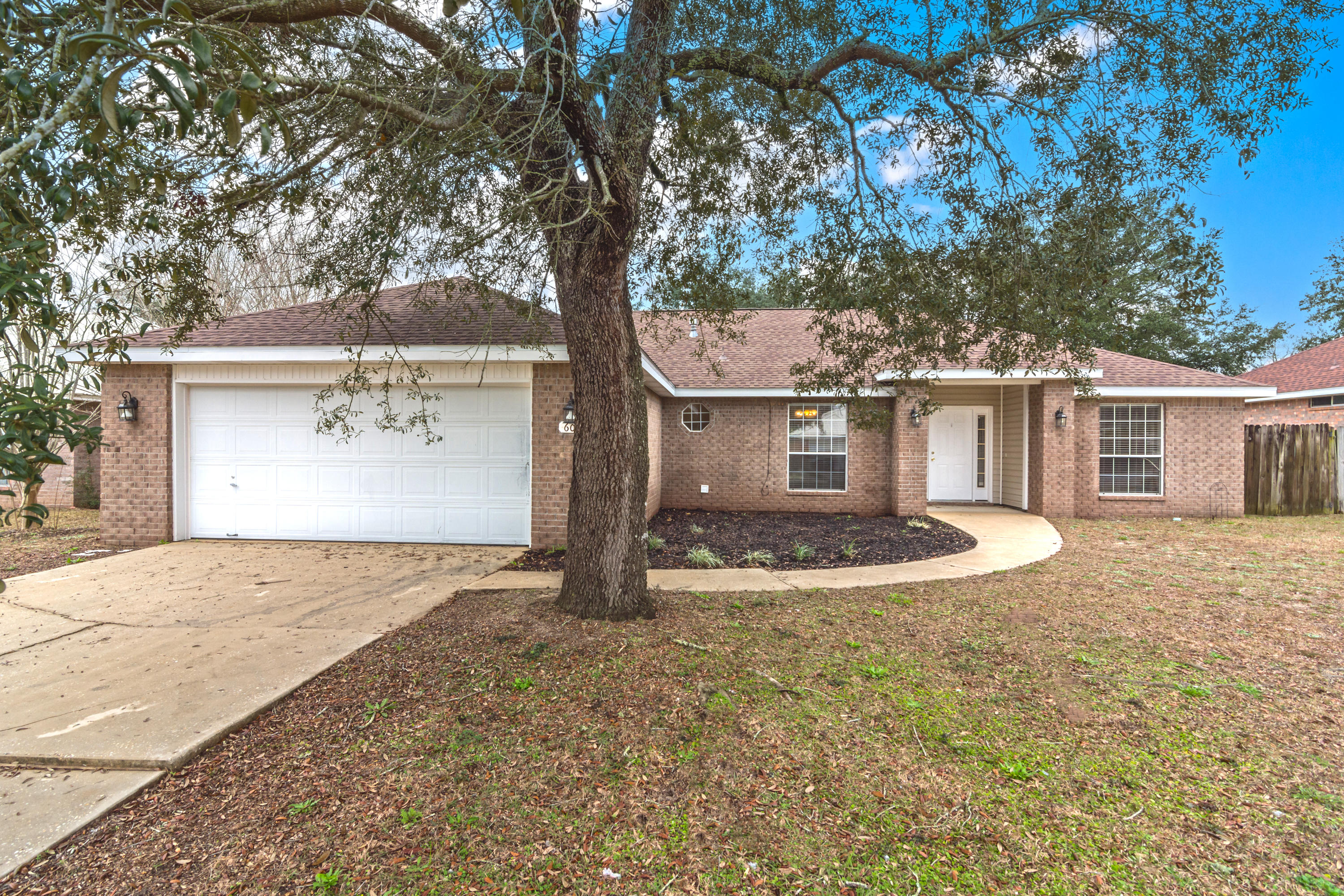 Welcome home! This home is the epitome of move-in ready! Stepping inside, the foyer transitions into a wide living space. The kitchen features stainless steel appliances and an island. The split bedroom floor plan will appeal to all. The master bedroom, located privately on one side of the home, will fit all of your furniture, and the master closet will fit all of your clothes and then some! The roof was replaced in 2019, and the HVAC is about 2 years old as well. Freshly painted and with brand-new carpet throughout, this home is ready for new owners. Schedule your appointment today!