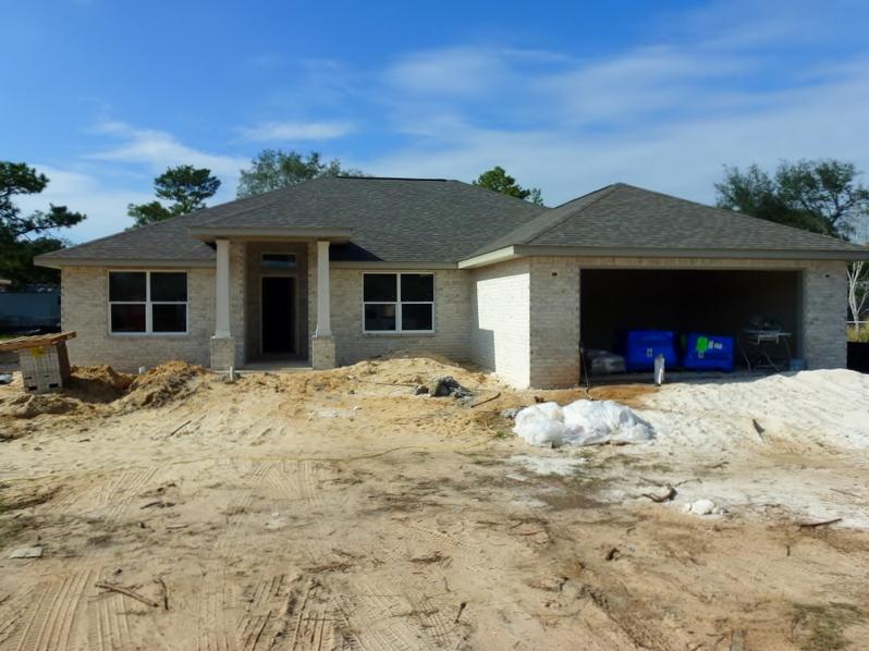 View ''SAMPLE'' 3D VIRTUAL TOUR of this Brand New Home which will Be MOVE-IN READY On or BEFORE 28 February 2017!! SELLER WILL ASSISTS WITH CLOSING COST. YES,THIS STAR QUALITY, CUSTOM BUILT, ALL BRICK, SPLIT FLOOR PLAN,4 BEDROOM 2BATH HOME,IS COMPLETE WITH AN ARRAY OF SPECIAL FEATURES ONE WOULD HOPE FOR. NINE-TEN FOOT LACE TEXTURED CEILINGS ACCENTED W/CROWN MODING IN TREY CEILING LIVING/GREAT ROOM/DINING AREAS. BEAUTIFUL 48''in. WOOD DESIGN TILE PLANK FLOORING. HIGH BASE BOARDS, FINISHED BULL NOSE CORNERS, AND CEILING FANS IN EVERY ROOM. FULLY LOADED KITCHEN EQUIPPED WITH STAINLESS STEEL APPLIANCES,CUSTOM BUILT CABINETS WITH GRANITE COUNTER TOPS. RAISED BREAKFAST BAR ADDS THAT SPECIAL TOUCH WHICH OFF SETS DINING AREA/BREAKFAST NOOK AND KITCHEN. MASTER BEDROOM SUITE WITH TREY CEILING... OFFER TRANQUIL OASIS WITH A TWO-AT-A-TIME PRIVACY BATHROOM DESIGN. CUSTOM MASTER BATH SHOWER, DOUBLE VANITY W/GRANITE COUNTER TOPS, AND LARGE WALK-IN CLOSET. LAUNDRY ROOM LEADS OUT TO FINISHED DOUBLE CAR GARAGE W/GARAGE DOOR OPENER. THE DOUBLE FRENCH DOORS OFF GREAT ROOM LEADS OUT ONTO COVERED PATIO, AND INTO LARGE, FULLY SOD, PRIVACY FENCED BACK YARD EQUIPPED WITH AUTOMATIC SPRINKLER SYSTEM. HAS UNDERGROUND UTILITIES TOO!! LOCATION IS CLOSE TO SHOPPING, THE BEACH, AND ONLY 6 MILES WEST OF HURLBURT FIELD AFB. YOU WON'T FIND A BETTER HOME FOR A BETTER PRICE! This One IS WORTH SEEING, AND WELL WORTH OWNING!