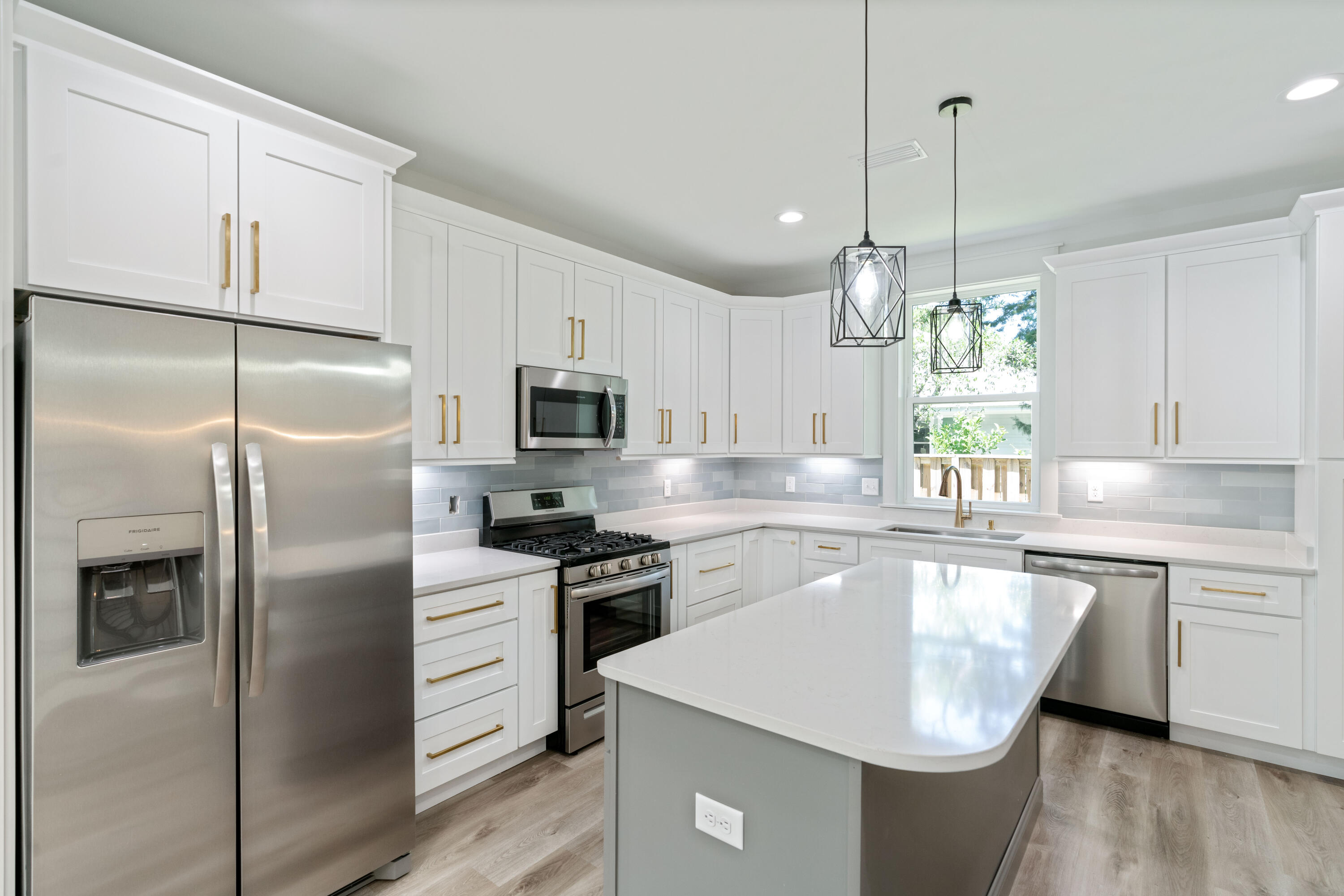 CLOSE PROXIMITY to everything! This two-story Florida cottage style NEW build by Coastyle Homes boast 1816 square feet heated and cooled with 4 bedrooms, 3 full baths located in the sought after Sacred Oaks subdivision PHS 2. The neighborhood features brick paved streets, underground utilities, street lamp post, and a wooden bridge walkover to the open bay with community shared boat dock. This stunning new home features a walk in open flow floor plan, with a bedroom or study/office on first floor, full bathroom/enclosed glass shower, kitchen, living and dining with center island quartz countertops and custom cabinets. Includes generous pantry and under stairs extra storage. This remarkable home also has a half garage to keep your golf cart or could be a work out room. Step out back to a wooden deck to relax, bbq, or just enjoy! Upstairs features 2 guest bedrooms, both with oversized closets and shared tub shower combination, quartz countertop and tile flooring. The master bedroom has walk-in closet with double shelving, his/her sink vanity with quartz countertop, water closet, and large walk-in subway tiled shower and floors. Oversized laundry room is located upstairs so washing/drying is made easy. This property is a MUST for anyone looking to be close to the 30A beach lifestyle! Easy access and minutes away from Sacred Heart Hospital, Grand Blvd for shopping/dining/movies and of course close to the world's most pristine beaches. Builder offering a 2/10 home warranty. Don't wait...your cottage home is calling!
