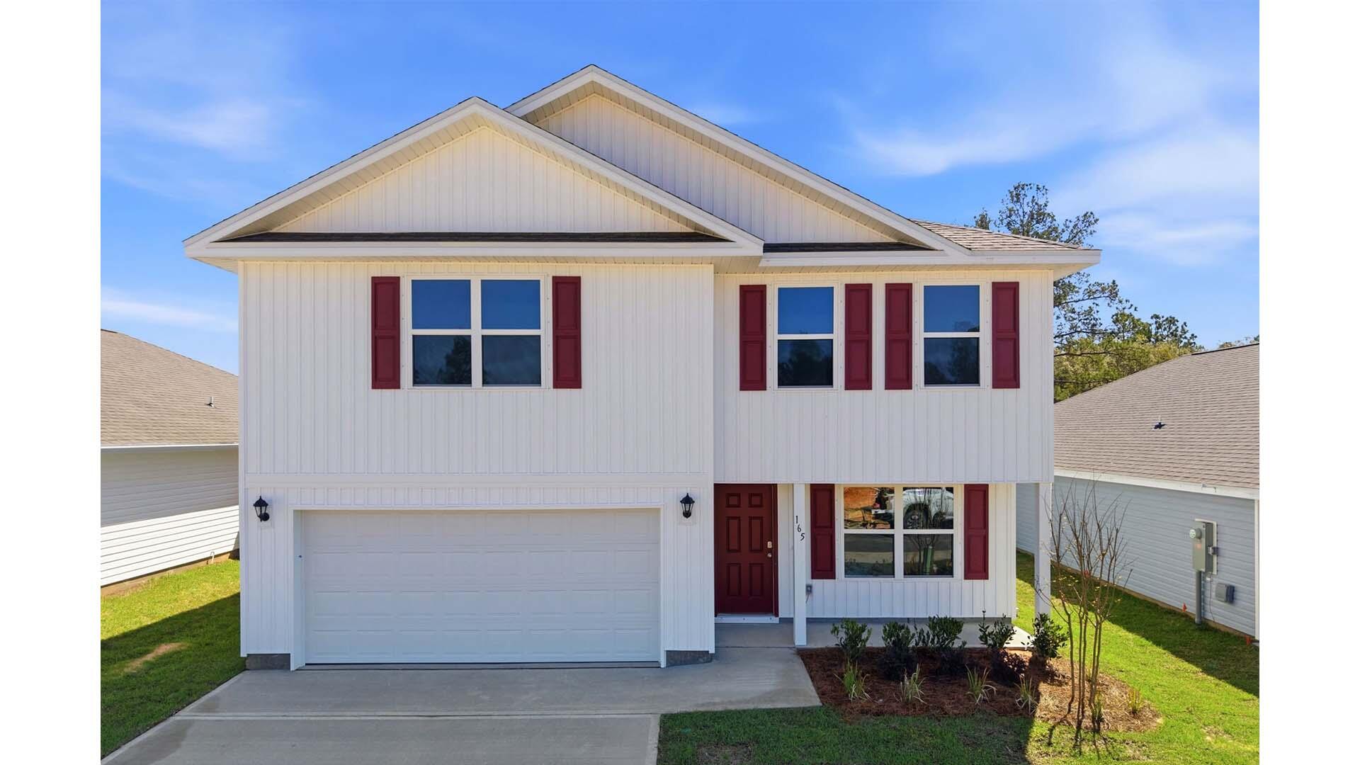 Welcome to 165 Dockside Road, a new home at Magnolia at the Bluffs in Freeport Florida. This is a two story home is ready for move in. Approaching this home, you will notice the covered front porch offering a space for outdoor seating. Enter this home to a bright entry with large flex space just off the foyer. This room is perfect for a formal dining room or study. Continuing through the hall you will find a half bath on the main level just as you enter the great room.

The main level features a grand living space that is open to the kitchen with center island, plenty of counter space with upper and lower cabinetry and a spacious corner pantry for storage. There is a back patio just off the living area that has space for dining al fresco.