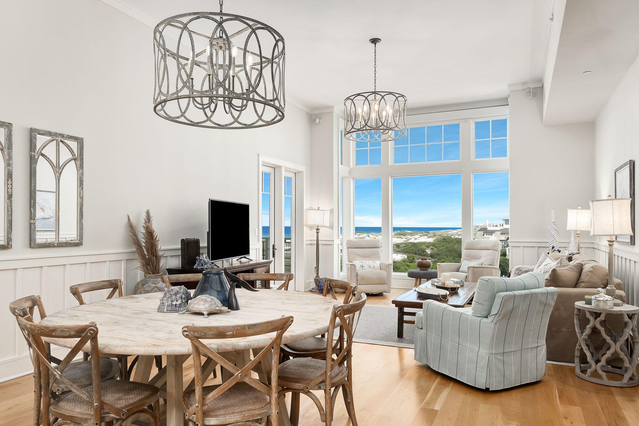 The most desirable top floor 2 bedroom unit in WaterSound Beach.  Spectacular Gulf and Beach views.  Watch the water break on the beach and see the most amazing sunsets over the dunes.  The view alone will sell this condo.  Two west facing decks and floor to ceiling Living Room windows make for some of the most amazing views on 30A.  This top floor unit is also one of the few with raised ceiling height.  The unit features upgraded wood flooring throughout, new HVAC and new Refrigerator.  Sold FULLY Furnished with a few exceptions, NEVER RENTED, shows like new.  This is a one of a kind property and must be seen to be fully appreciated.   This unit also features the best garage space in the building just off of the elevator and with a large storage area.  Also comes with golf cart parking Golf Cart Parking is in the garage and allows you to easily charge and store your golf cart.  Ready to move in and enjoy!