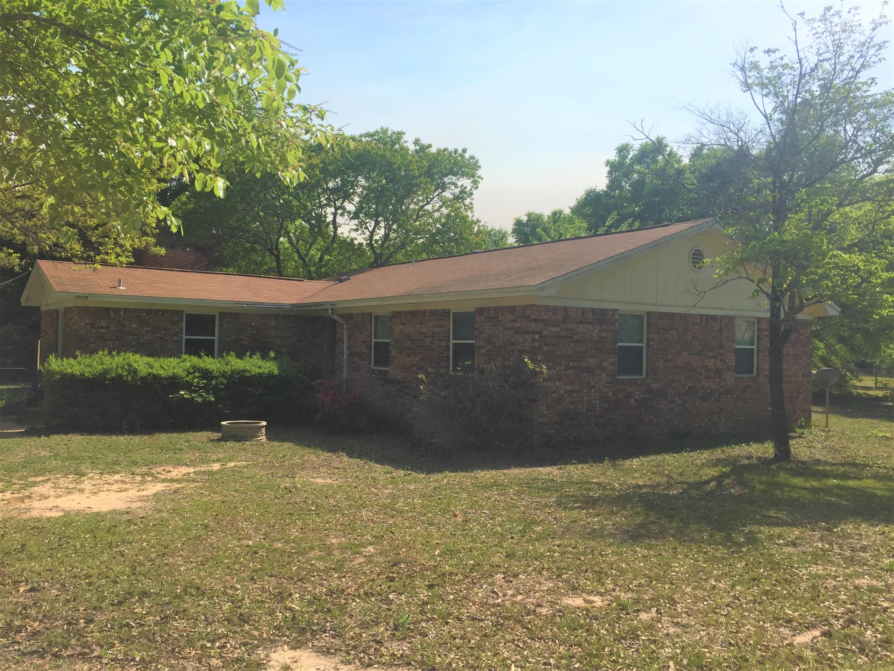 Lots of room. This 3 bedroom 2 bath,1575sf home boasts a large brick fireplace in the living room and large master suite with bath. Home has a cozy kitchen/Dining area with bay window, a formal dining area, ceramic tile, play yard for the kids or grand kids, and indoor laundry. This property is on 2.5 acres in the country and very little traffic. Great starter home for a growing family!! PET FRIENDLY!! CALL TODAY!