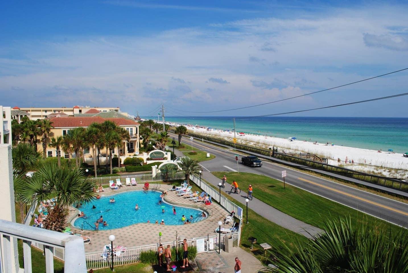 LOCATION, LOCATION, LOCATION! The two building at Maravilla sits parallel to the beach and overlooks the beautiful Gulf of Mexico which makes this condo a RENTAL MONSTER! This turn-key property is on the top floor and gives you have incredible views of the Gulf. Even better, you have these gulf views and access to the gulf front balcony from both the living room and the master bedroom. The condo has 2-bedrooms and 2-Bathrooms so there is plenty of room for family and friends. The living space is tastefully outfitted and has a sleeper sofa. As an added bonus this unit has a full-sized washer and dryer. Maravilla is PET FRIENDLY! You will love all the amenities Maravilla is PET FRIENDLY! You will love all the amenities: There are two swimming pools,