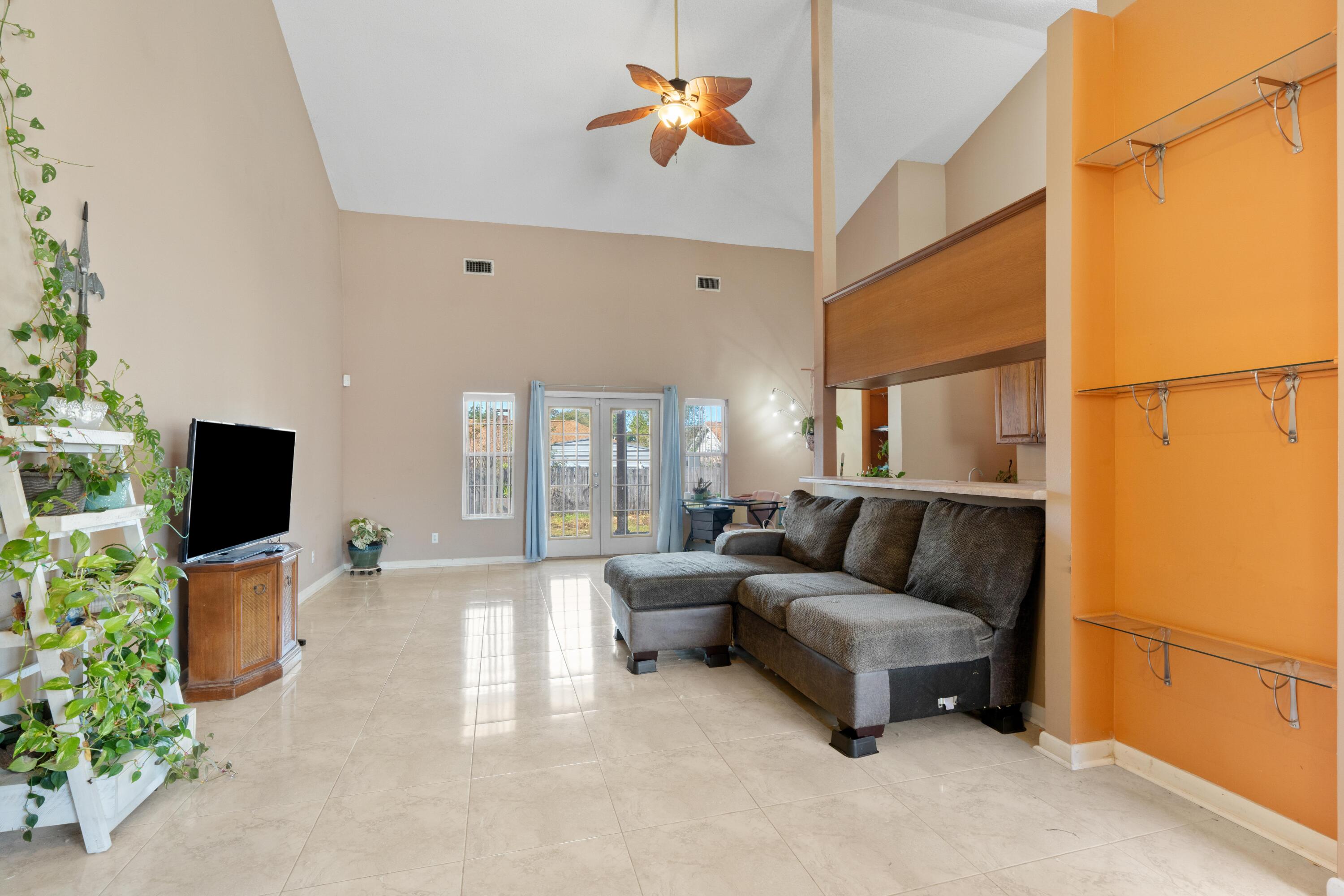 Welcome to this inviting 3-bedroom, 2-bath home in the heart of Mary Esther, just minutes from the beautiful white sands of Fort Walton Beach. Step inside to discover high ceilings that create an open, airy feel throughout the living spaces. The home features tile flooring in every roomboth stylish and practical for coastal living. The primary bedroom offers generous space and comfort, while the additional bedrooms are well-sized, perfect for family, guests, or a home office.  Outside, enjoy a spacious lot with a fully fenced, wood-gated backyard and a covered patioideal for outdoor gatherings, pets, or simply relaxing in privacy. There is an assumable VA Loan available for Veterans at 4%, buyer must have the difference from the loan in cash and money for downpayment.

The listed price includes the installation of a brand-new roof, which will be paid for by the seller ( with acceptable offer)  The seller understands that some minor storm wear from a past hurricane makes this the perfect time for an upgrade, ensuring peace of mind for the next homeowner. Buyers can even select their preferred shingle color!

Conveniently located near local shops, restaurants, and the beach, this home combines comfort, space, and locationeverything you need for easy Gulf Coast living.