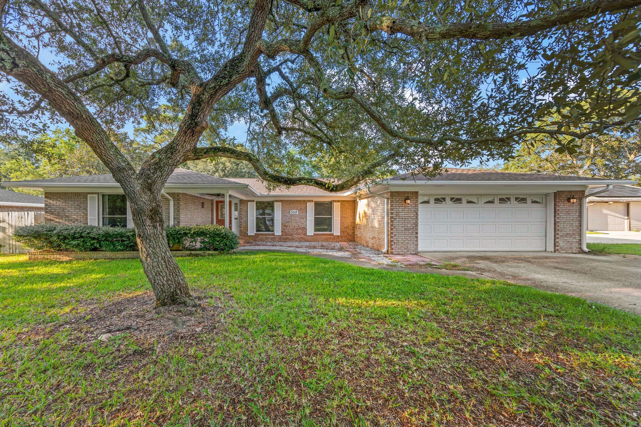 Upgrades, upgrades, upgrades! This 4bd/3ba home is elegantly laid out over 2,377 square feet.  The spacious and beautiful chef's dream kitchen is complete with double ovens, glass accented cabinetry, stainless appliances, ample amounts of storage, granite counters and more. Let's take you through to the main living space where built-in shelves sit atop gorgeous LVP flooring that is complimented by modern baseboards and neutral paint tones. Expansive windows throughout the home invite relaxing natural light. Access to the paved patio is available through three areas of the house offering personalized convenience. Once outside, escort your guests to the oversized fire pit space that's nestled within the sprawling fenced in backyard. Relax the night away while you gather under the solar string lights where there's room enough for everyone. Don't miss the opportunity to live in this ranch style open concept beauty, call today for a showing.