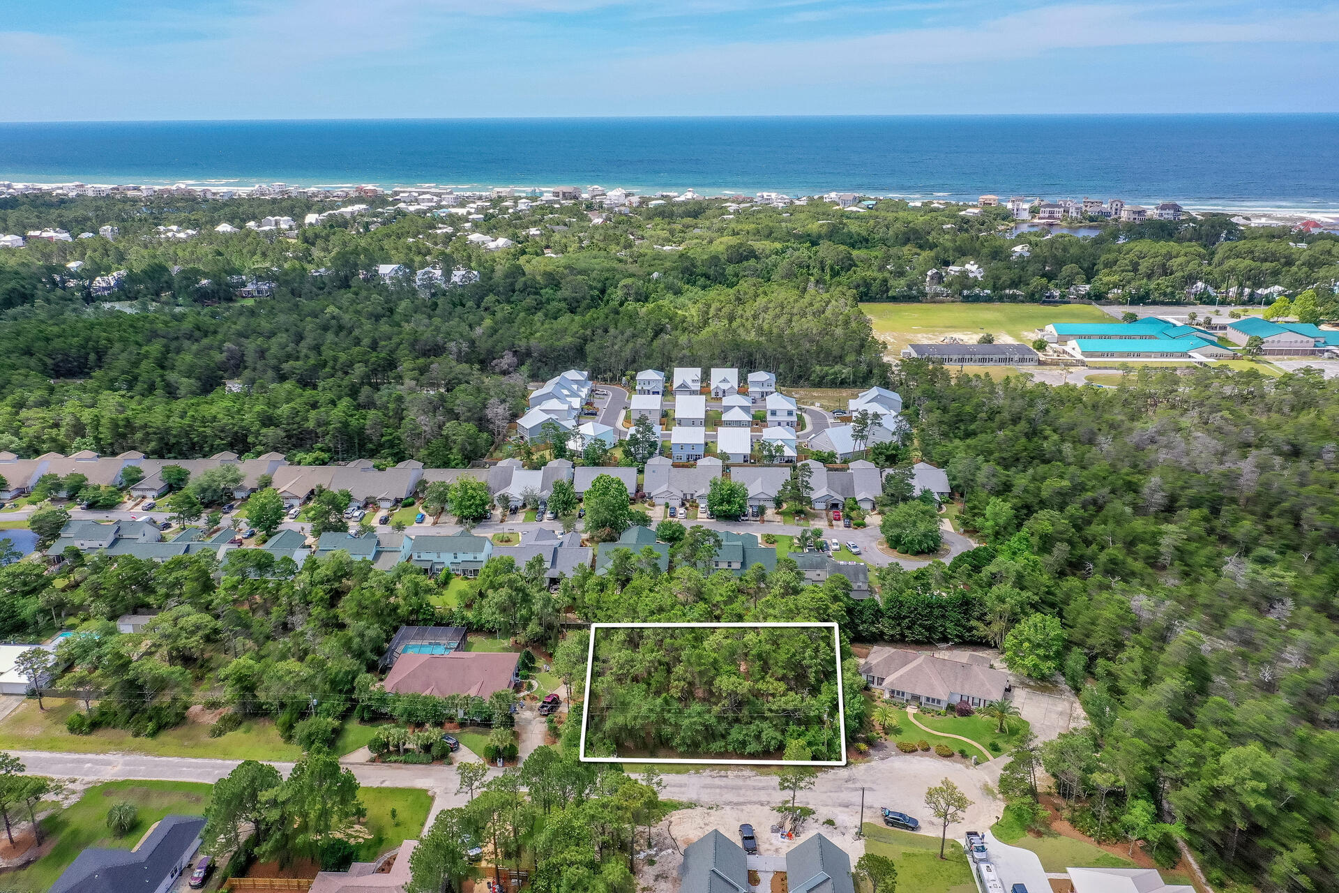 Prime location!! Are you looking to build your perfect home? Consider this nearly half acre lot surrounded by Preserve State land in a quiet neighborhood in Santa Rosa Beach to build your getaway home, rental property or forever home. Imagine your dream coastal home with privacy and plenty of desirable space to add on a pool, carriage house and private recreational space!  Many options possible on this large lot and NO HOA assessment fees! Go for some fun in the sun or simply to relax near the serene ocean waves by choosing from multiple beach access points just minutes away. Explore the nearest nature trail beginning from behind the lot for a shortcut to Scenic Hwy 30A and Butler Elementary. 

This is truly an incredible homesite nestled amongst all the best shopping, art galleries, restaurants, state parks and emerald coast waters the iconic Scenic Hwy 30A has to offer. Venture out to Topsail Hill State Park and Preserve with miles of nature trails, secluded white sandy beaches, camp sites, family activities and tram to the beach. Enjoy some of the best local cuisine and entertainment at the Gulf Place Town Center. Discover the award winning restaurants including Shunk Gulley Oyster Bar, Pizza by the Sea and The Perfect Pig Grill and Fish House. Experience "Florida's treasure" known as the rare and tranquil coastal dune lakes where you can go kayaking, fishing and standup paddle boarding! 

This home is not in a flood zone. Survey and elevation plans available. Remaining house plans are available with the purchase of this lot. All information on this property are deemed correct, but buyer is responsible to verify and conduct all due diligence for their plans with the property.
