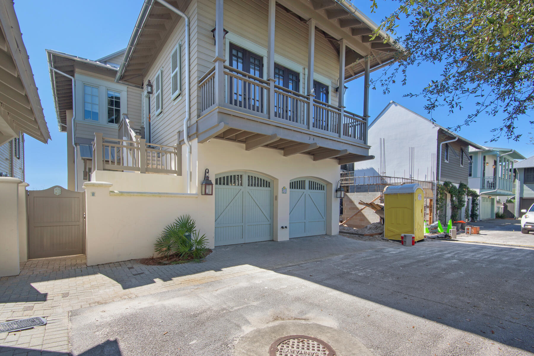 Prominently placed on the Gulf in Rosemary Beach, this essential escape on Atwoods Court boasts a complete renovation, exquisite finishes, and architectural beauty. As you enter the residence, you notice a quiet & tucked away courtyard in between the carriage & main house. 

Upon entering the main house, you are greeted by a lovely cubby space & a delightfully placed staircase. The first level offers two bedrooms. The first bedroom you reach is a tasteful bunk room with a walk in closet & en suite bathroom. 

Throughout are lovely finishes such as grey-stained hardwood floors, a modern tile, & fresh decor. Across the hallway is the first floor master bedroom with towering ceilings, & an extra sitting area overlooking Bahama shutters outside the window. 

The master bathroom is marvelously laid out with a long master double vanity countertop with an oversized soaking tub, a tile shower, & an inviting walk-in closet. 

As you reach the second floor, you are greeted by a wonderful Gulf view. After brushing past a beautiful reading/sitting area & a powder bath, you enter the main living space decked out with a fireplace, vaulted ceilings, & a speaker system, this is certainly the main gathering space. Ample dining space is offered indoors or outdoors along with bar seating across the countertops. The kitchen is a warm and open space with its sub-zero refrigerator & wine cooler. The laundry room is also within reach from this area. 

As you soak in the gorgeous Rosemary Beach views, you have another level which includes a bedroom complete with its own walk-in closet, & master bathroom with a tile shower & double vanity. 

Leaving the main house, you have a two-car garage which is essential for extra storage & above is the wonderfully-designed Carriage House which is perfect for a quick weekend getaway and boasts sleeping for 4-5 people & a fully-stocked kitchen along with a long balcony outside.