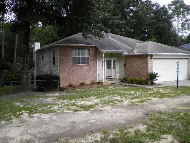4 Bedroom South of I-10 on quiet cul-de-sac! Call today to view this roomy split foyer, 4BR/3.5 BA house on 1/2 acre fence lot with living room, kitchen, breakfast nook, dining area and master bedroom w/ sitting area on main level with access to the deck on the back and the additional 3 bedrooms and family room with fireplace downstairs with access to the screened porch. The home also has a two car garage with opener and a storage shed. Owner may be willing to leave the counter top microwave if needed, but will not be warranted, not built in, sits on counter. Pet considered on case by case basis.