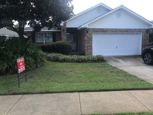 Stroll to your deeded, private beach access, from your home that is just  the second one inside the gated community right off Scenic Gulf Drive. This four bedroom, two bath home would make an ideal full- time home for beach lovers or vacation home/rental investment property. The home features an open floor plan with updated wood flooring in the living areas.  Covered patio and backyard that backs up to a wooded preserve behind the house.