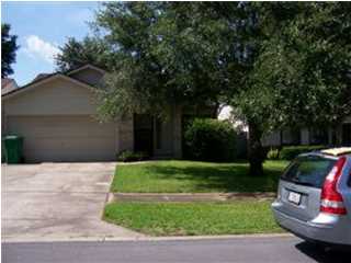Great location in quiet sub division. Close to college, schools, shops and bases. Open floor plan with bright open feeling. Living/Dining area with vaulted ceilings. Fireplace. Large kitchen with room for breakfast table. Master bedroom with master bath, walk in closet. Screened sun room off kitchen. Fenced backyard and sprinkler system. NON SMOKING UNIT. NO PETS.