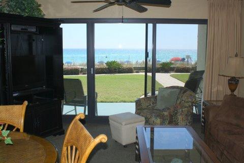 A quaint 3-story building, unit is located directly on the beach in the heart of Destin. A one bedroom fully equipped unit. With a king-size bed in the master bedroom, two bunk beds built into an alcove in the hallway, full-size kitchen, bath and a half. Come take a look you won't be disappointed. Destin Realty, Inc. is the on-site rental management company with over 30 years experience in the property management business.