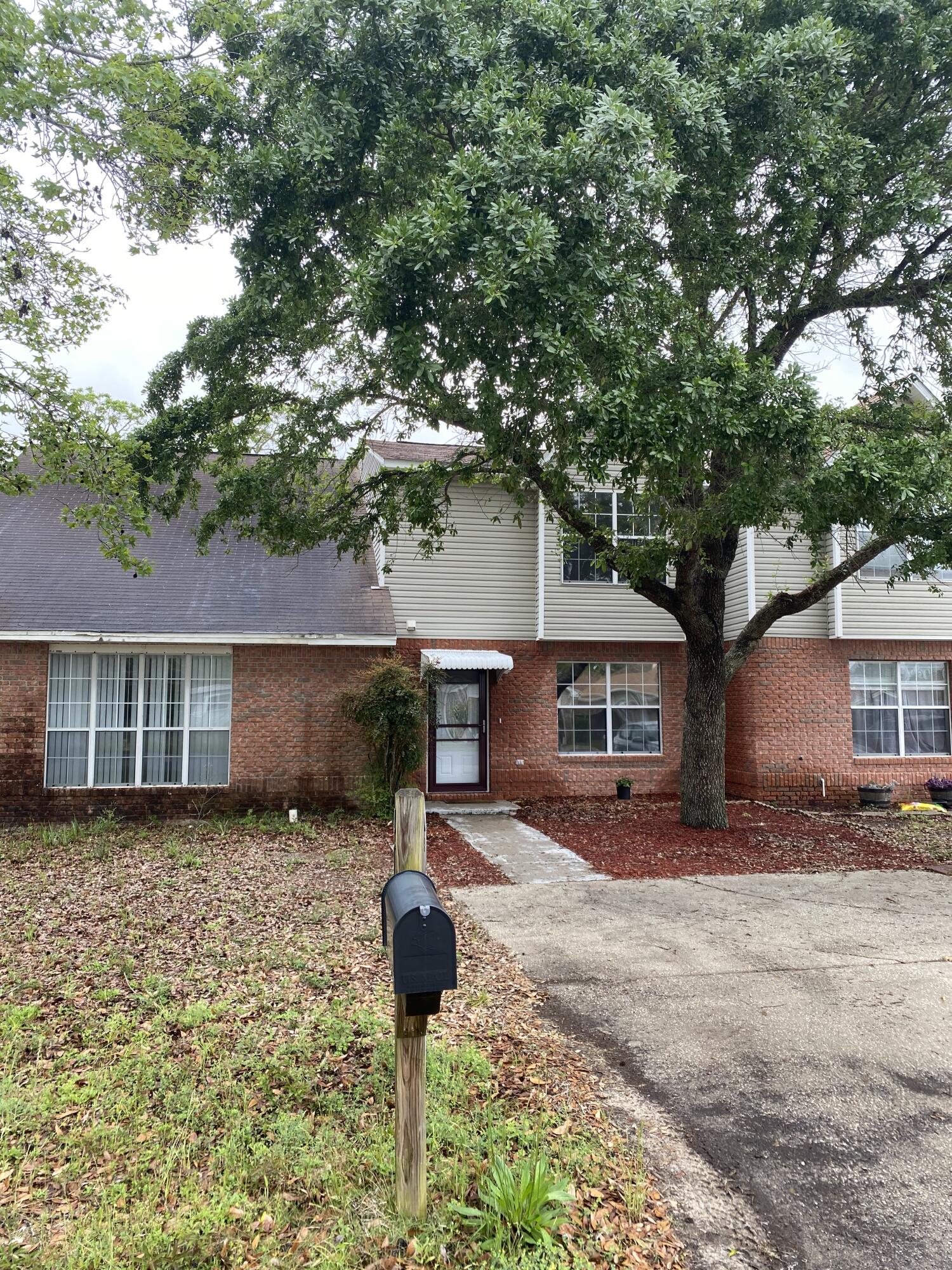 Perfectly located townhome west of Hurlburt, Easy access to beaches, shopping, restaurants, schools and more.  Completely Renovated 2 bedroom 1.5 bathrooms.  New paint throughout, New flooring including w/w carpet and laminate vinyl plank, New patio door, New to code electrical panel and newer water heater and HVAC.  Kitchens and baths also renovated with new stone and appliances. Back yard has an open patio and privacy fenced in yard. Washer and dryer convey as well as mounted TV's.  Whether for a personal residence or investment property this unit is ready for you.
