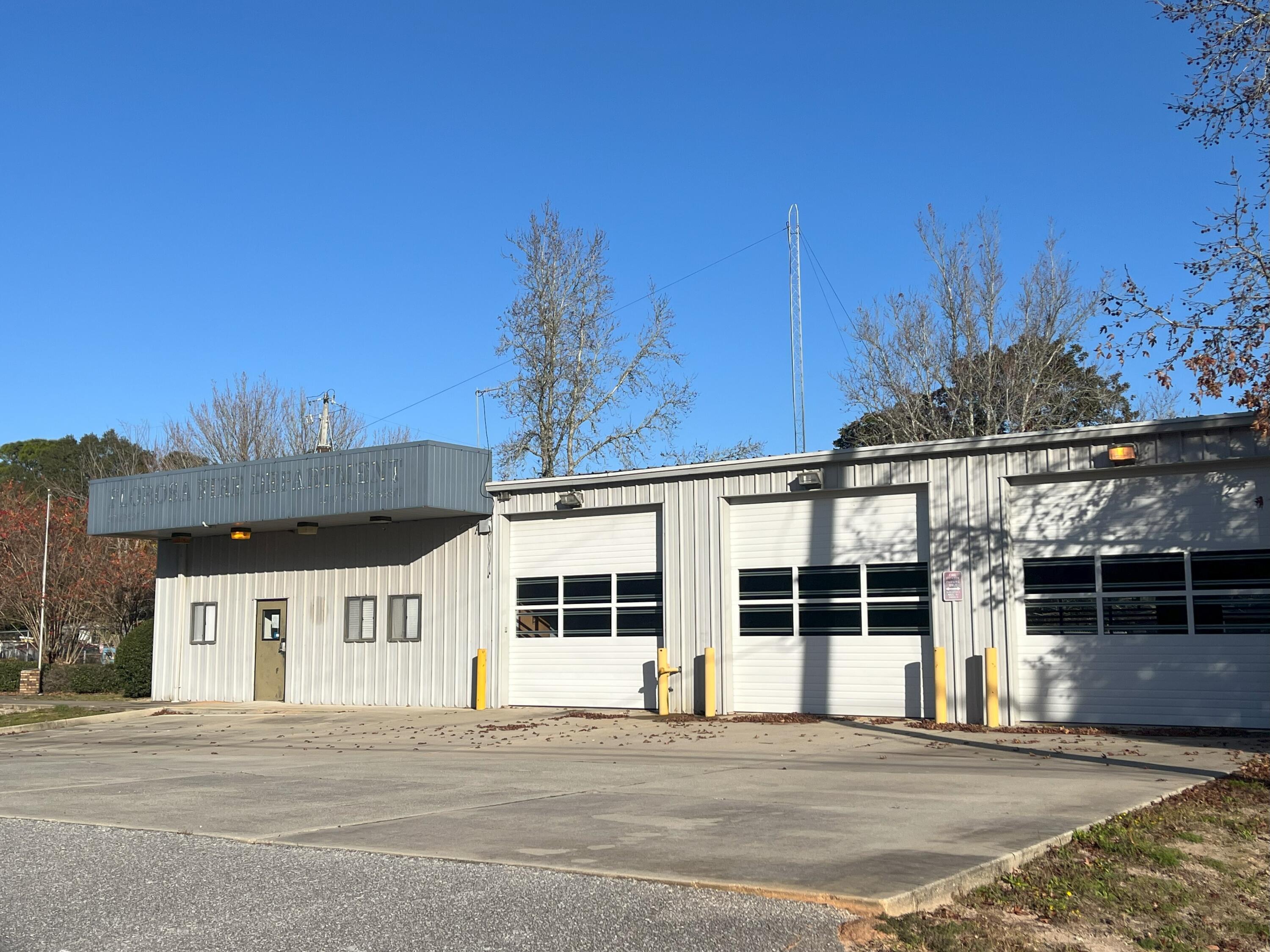 Former Florosa Fire Department Site

Property Highlights:

Full Office Build-Out: This versatile warehouse space features a complete office build-out with four offices, providing ample workspace for your business operations.

Kitchen and Lounge Area: Enjoy the convenience of a full kitchen and lounge area within the office space, creating a comfortable environment for your team.

Strategic Location: The property boasts high visibility and accessibility. It's an ideal location for businesses looking to make an impact. Roll-Up Doors: The warehouse includes three roll-up doors facing south towards Hwy 98, offering easy access for loading and unloading. Additionally, two roll-up doors at the back provide flexibility for access from both the front and rear of the property.

Additional Features:

Versatile Layout: The warehouse layout is designed to accommodate a variety of industrial activities, making it suitable for different business needs.

Secure and Spacious: With ample space and secure access, this property is tailored to meet the requirements of businesses seeking a reliable and adaptable light industrial space.
