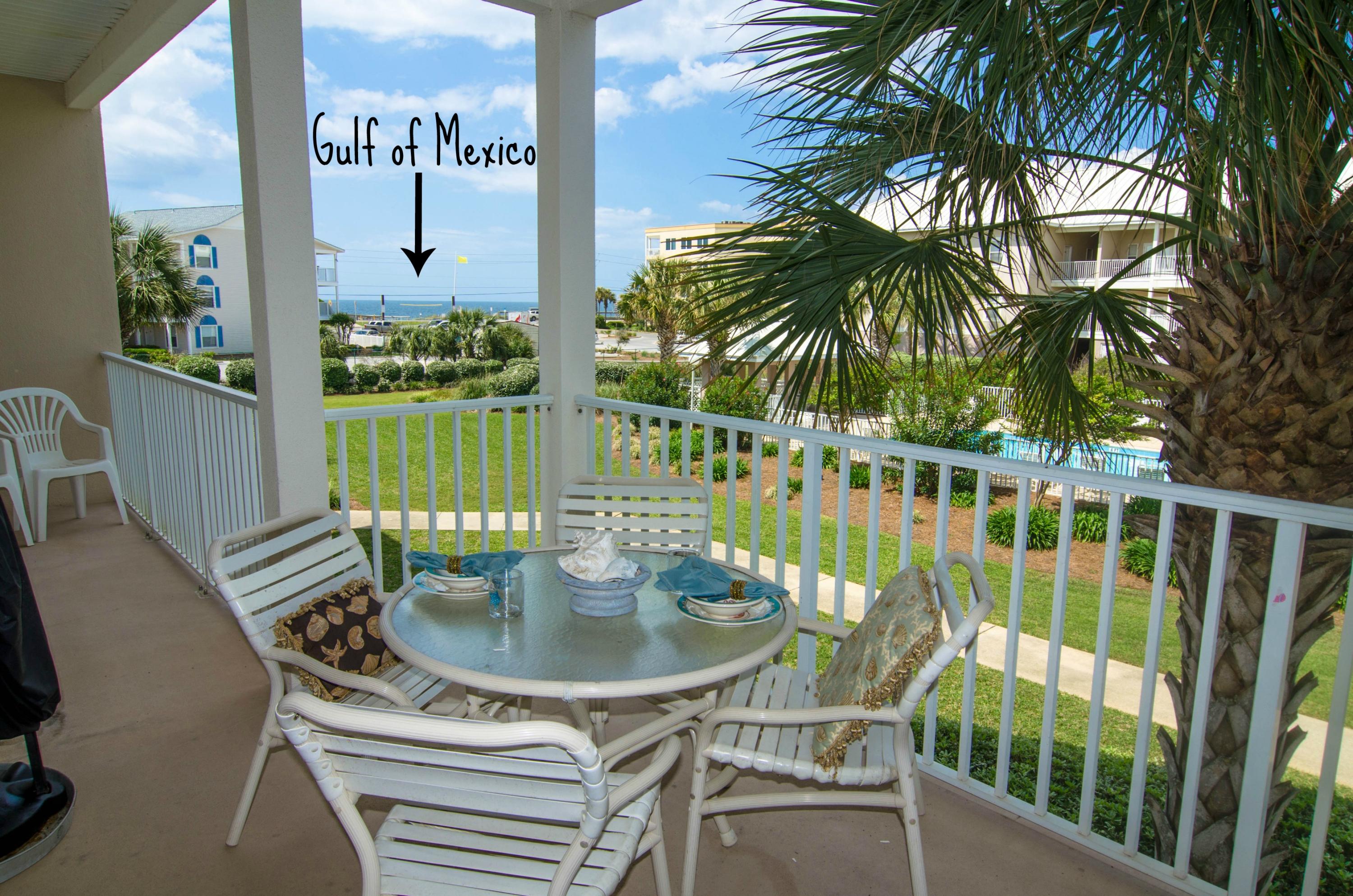 In Pavilion Palms, home to the ultimate luxury coastal lifestyle - you'll find this fabulous condominium residence. Against a backdrop of shimmering Gulf views, revel in this spacious 2 bedroom, 2 bath condo + 2 car garage that has many wonderful finishes including upgraded tile floors throughout the living areas and hardwood floors in the bedrooms! The open and spacious living room lives large and opens to the oversized balcony which overlooks the Gulf, pool and lush landscaping. The chef's delight kitchen has loads of cabinet space and a high bar for extra seating! The Master Suite has balcony access and a remodeled bathroom featuring a stunning custom granite vanity. The beautiful Guest Suite has hardwood floors and guest bathroom access. There is also a full sized laundry room. A very rare and unique property...not your typical shoebox condo! And to top it off, this condo conveys with a HUGE tandem private garage with space for 2 cars PLUS a large storage closet- unheard of at any price at the beach!  Pavilion Palms is a low density building with great amenities including a pool, tropical landscaping, gated entry and ample parking!  Gross Rental $27,155..59 2014; $26,903 in 2013 $26,467 and $23,866 in 2012 (Self managed with owner use)