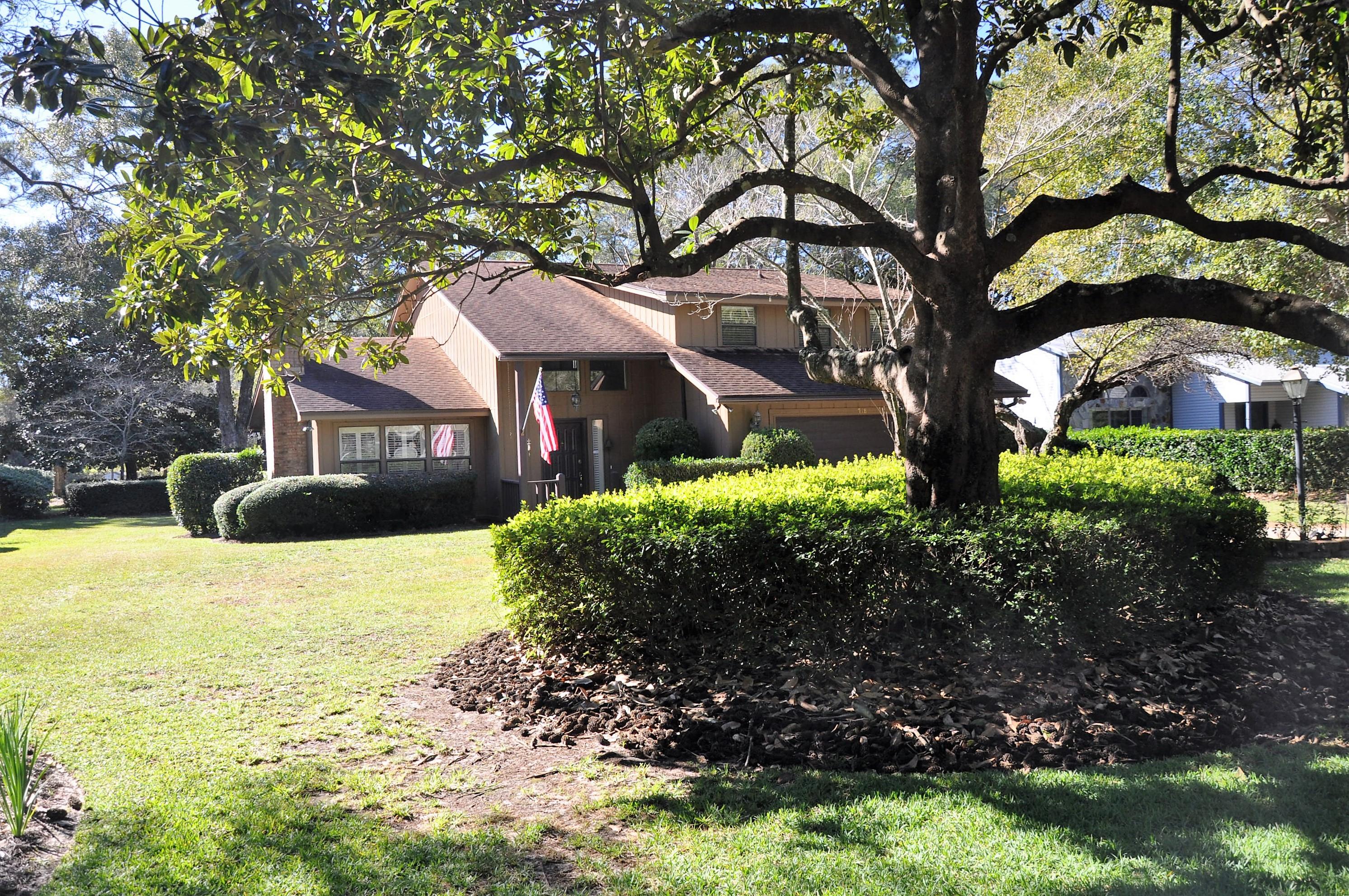 Ready to go!! 4 Bedroom, 2.5 bath family style golf course home in popular Bluewater Bay. Home is Very well maintained and yard is nicely landscaped. Open comfortable floor plan with large size master bedroom and bath on the first floor with 2 closets & storage cabnets. Master bath has handicap features. Kitchen has plenty of cabinets and granite counters. Beautiful gas fireplace with large mantel. Home features a bright and spacious sun room - great for relaxation and entertaining with wet bar & ice. 3 bedrooms on second floor with a large great room/study/a flexible use room. Large screened in porch that overlooks the golf course. Close to everything: schools, churches, shopping, recreation, Eglin Air Force Base, the area's largest employer, and Destin's world class beaches. A must see