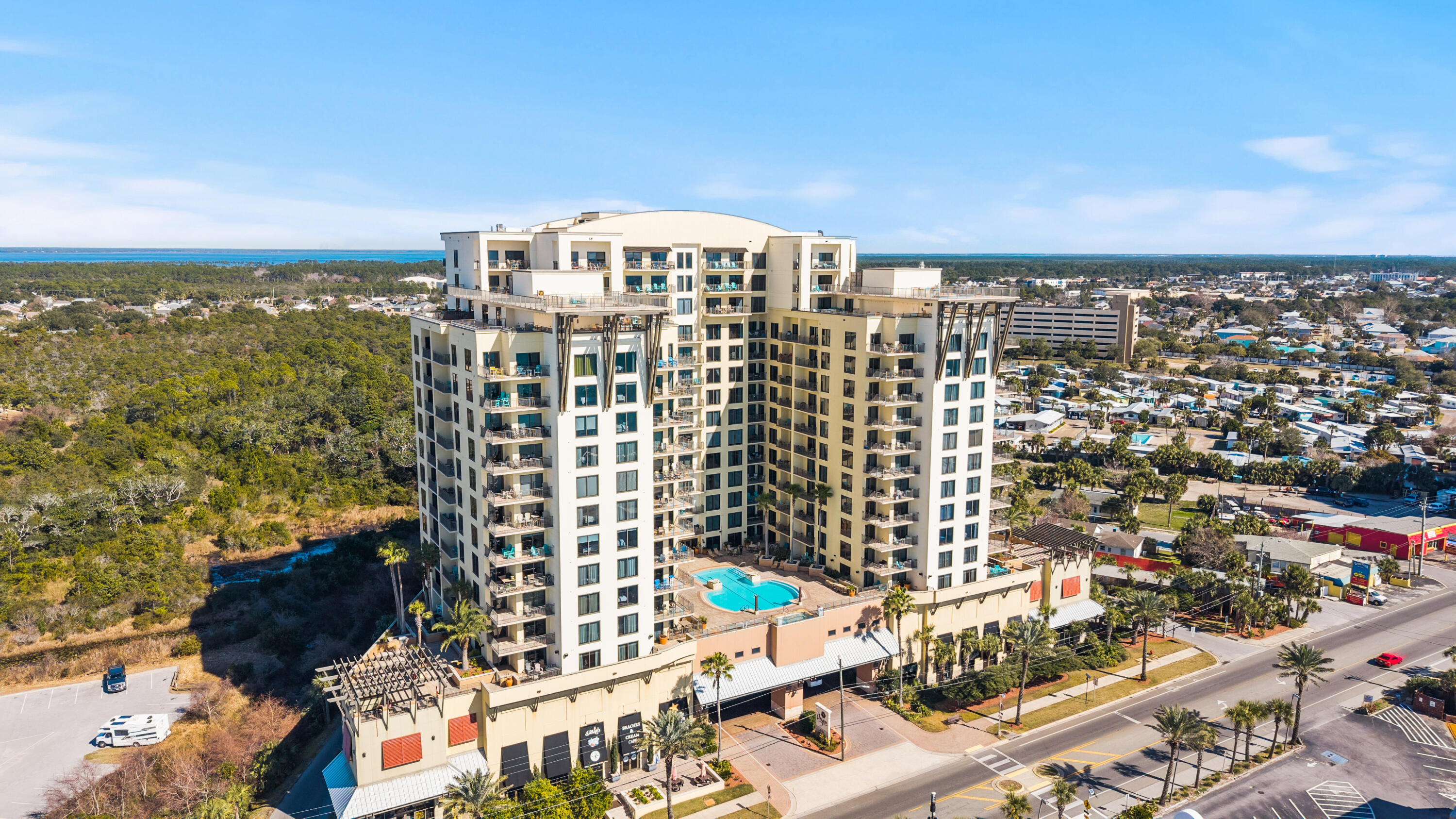 Experience the ultimate Beach lifestyle in this stunning 16th-floor penthouse condo. Unit 1604 offers a rare expansive private rooftop balcony with sweeping 180-degree views of the Gulf, Pier Park, and West Bay; perfect for sunrise, sunset, and front-row seats to multiple fireworks shows. Step inside to find breathtaking Gulf views through the wall of windows in the living room and kitchen. The split floor plan features two primary suites with en-suite
baths and walk-in closets, plus a third guest bedroom with a full bath just across the hallway. The spacious living and dining areas provide plenty of room for entertaining. Unit 1602 is a lockout unit and is also available for purchase, offering the rare opportunity for a 6-bedroom penthouse.