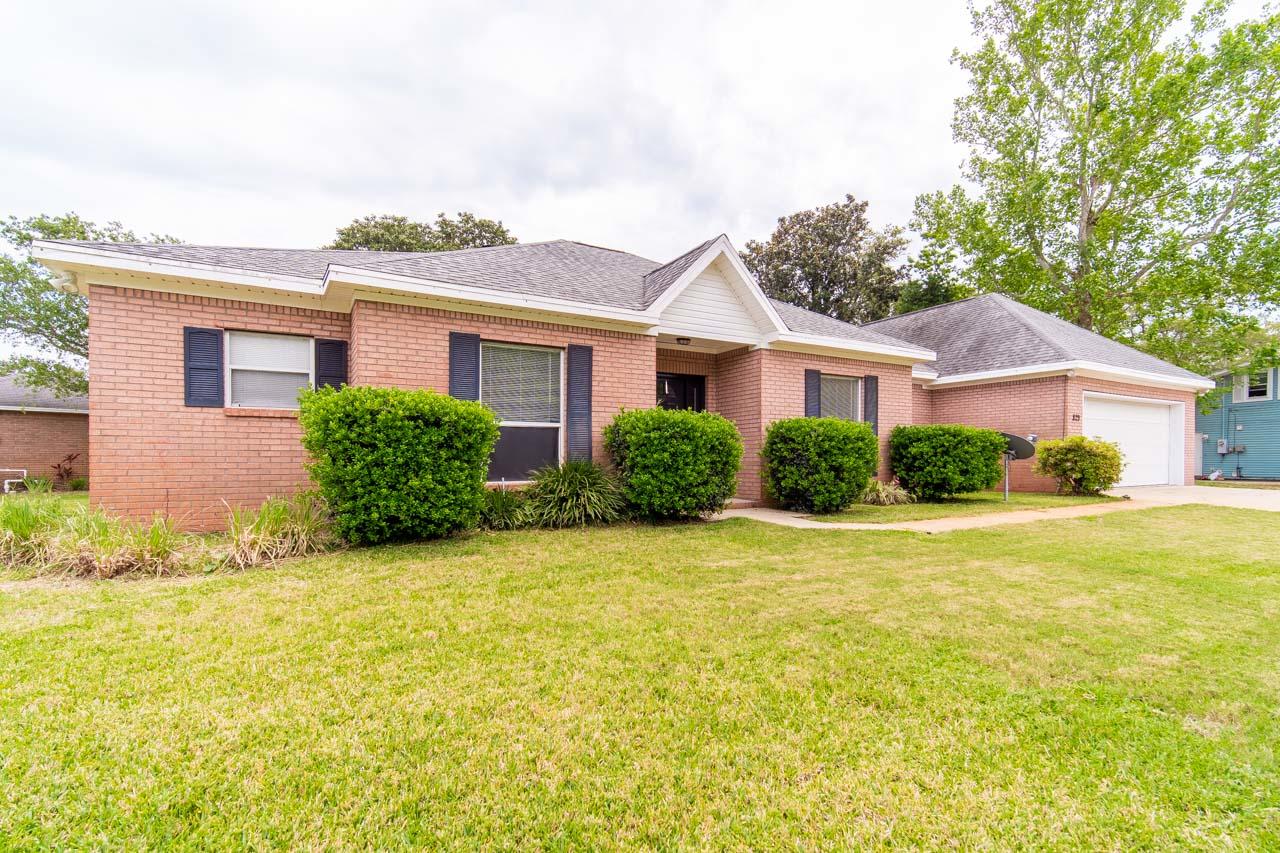 Immaculate home in the heart of Destin with no HOA that features a newer HVAC system, water heater and an extended driveway big enough to park a boat. This home is minutes away from the beach, airport and fine dining. As you enter the residence, you are greeted by an open floor plan, a beautiful wood burning fire place and a modern kitchen with stainless steel appliances.The master suite is tucked away from the other bedrooms offering privacy and access to the backyard. Each bedroom has a spacious bathroom that offers dual vanities with plenty of counter space. Situated on a corner lot with a large screened in back porch and a home office, this home would be perfect for entertainment.