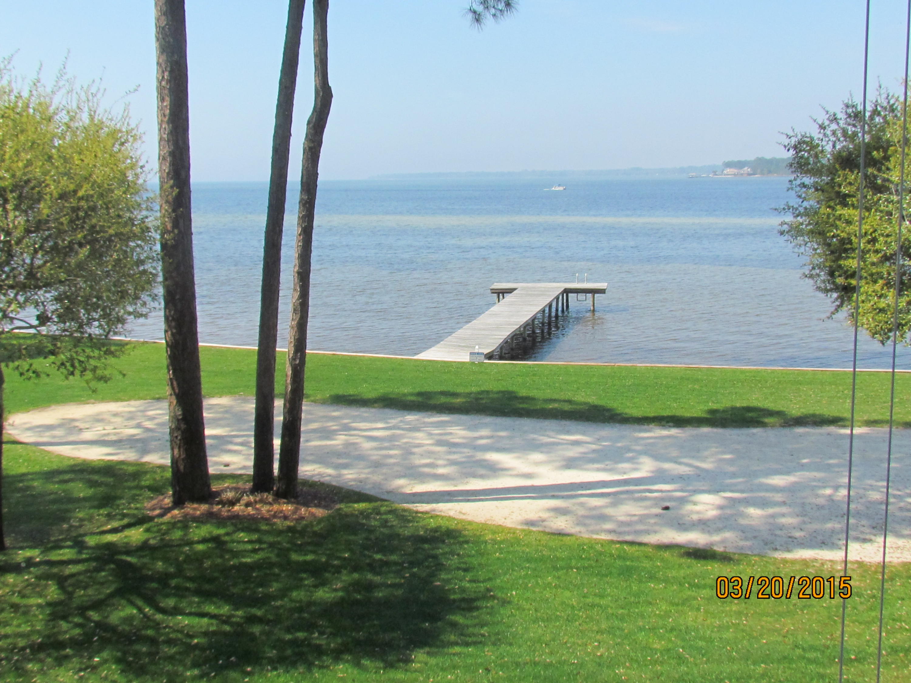 Enjoy the beautiful view from this waterfront studio apartment in Bluewater Bay, just minutes from the marina. The complex has a large waterfront area with plenty of room to enjoy the view. The studio has a full bath complete with a washer and dryer. Kitchen has all the appliances, cookware, and dishes. Tons of storage along one wall in the living area. No need to bring anything but your suitcase! Rent is $1200/month, which includes water, sewer, trash, and electricity. Absolutely no pets and no smoking allowed!! Call today for your showing appointment.