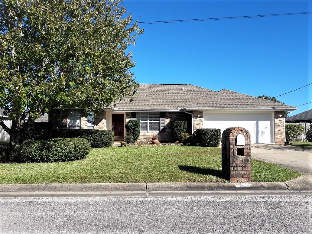 EXCELLENT CURB APPEAL, ARTFULLY LANDSCAPED, ALL BRICK, WELL MAINTAINED,TASTEFULLY CUSTOM PAINTED, 3BR/2BA HOME. DON'T LET THE SQ FT FOOL YA! YOU GET THAT WARM SPACIOUS AIRY FEELING AS YOU ENTER VAULTED CEILING LIVING ROOM. THE LUSTROUS LAMINATE WOOD FLOORS AND MANTEL RAISED HEARTH FIREPLACE ADDS COZY NOTE. THE KITCHEN IS NO EXCEPTION! SNUG SNACK BAR SETS OFF CERAMIC TILE KITCHEN, AND COZY ADJACENT DINING AREA W/LARGE BAY WINDOWS FOR THOSE INTIMATE DINNERS FOR FRIENDS AND FAMILY. MASTER BEDROOM OFFERS TRANQUIL OASIS WITH A TWO-AT-A-TIME PRIVACY BATHROOM DESIGN. ALL BEDROOMS ARE NICE SIZED BEDROOMS W/WALL-TO-WALL CARPET AND CLOSET SPACE THAT WILL AMAZE YOU. LOOK AT THIS YARD. THIS HOME HAS A HUGE BACK YARD FOR FAMILY FUN AND ENTERTAINING. FULLY SODDED PRIVACY FENCED YARD W/(8X10)SHED FOR EXTRA STORAGE. ALSO, LAWN PUMP AND AUTOMATIC UNDERGROUND SPRINKLER SYSTEM. OTHER EXTRAS INCLUDES: BLINDS THRU-OUT, PORCELAIN TITLE IN KITCHEN/DINING AREA AND PORCELAIN/CERAMIC TILE IN BATHROOMS, LAMINATE WOOD FLOORS IN FOYER, HALLWAY, AND LIVING ROOM,  CARPET IN ALL BEDROOMS, CABLE/PHONE OUTLETS AND CEILING FANS THRU OUT, SECURITY ALARM SYSTEM, GARAGE DOOR OPENER AND BACK STORM DOOR JUST TO NAME A FEW. WORTH SEEING, WORTH RENTING. Sorry NO Pets.. SHOWN BY APPOINTMENT ONLY.