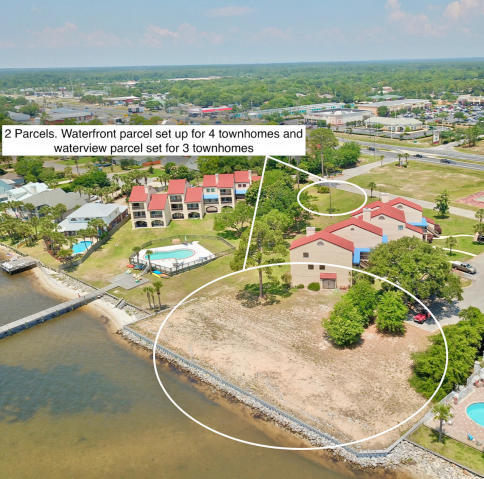 RARE WATERFRONT BUILDABLE LOTS! Developer opportunity to purchase this Prime 187' of HIGH & DRY Sea walled , R-2 multi-family zoned location in the heart of Navarre. Potential is endless and the price is right for this type development opportunity. Over 187 feet of Sound Front footage! All infrastructure is in place including water, sewer, underground electric and seawall along sound front; Getting the property at this low price, in front of demand will offset any additional infrastructure cost. Take advantage of this value now. Zoning has already given the possible heads-up on 3 units on the interior parcel and on the waterfront. Seller has Engineering & Surveys showing layouts for a projected high return townhome project. Conveniently located by the new proposed plans for a town center including retail space, restaurants and a movie theater! There is a recorded ingress and egress easement with the county for Hwy 98; Possible to build up to 4 or 5 units by the water and up to 4 units up front area.