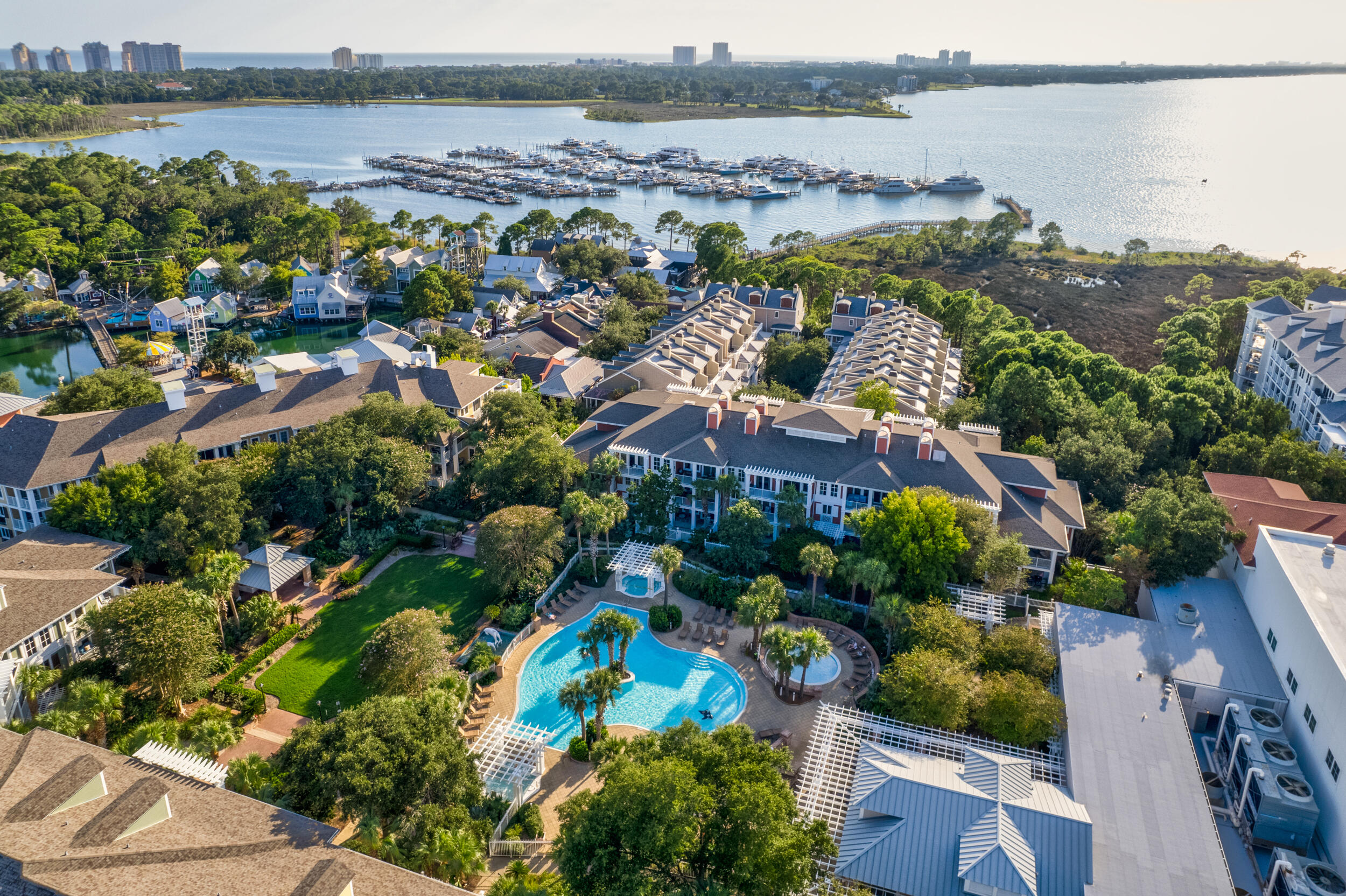 Experience the ultimate resort lifestyle at Pilot House 508, a stunning turnkey one bedroom, with bonus room, perfectly positioned in the heart of Sandestin's Village of Baytowne Wharf. This coastal retreat features a spacious floor plan with a private balcony, and immediate access to the exclusive Pilot House amenity terrace--boasting a tropical pool, hot tubs, and fitness center. Whether you're looking for a high-performing short-term rental or a personal getaway, you're just steps from world-class dining, championship golf, and the sugar-white sands of the Emerald Coast. Additional perks include gated and garage parking, along with access to the exclusive Founder's Club, featuring a media center, billiards, and a panoramic balcony overlooking the events lawn and Baytowne Wharf stage.