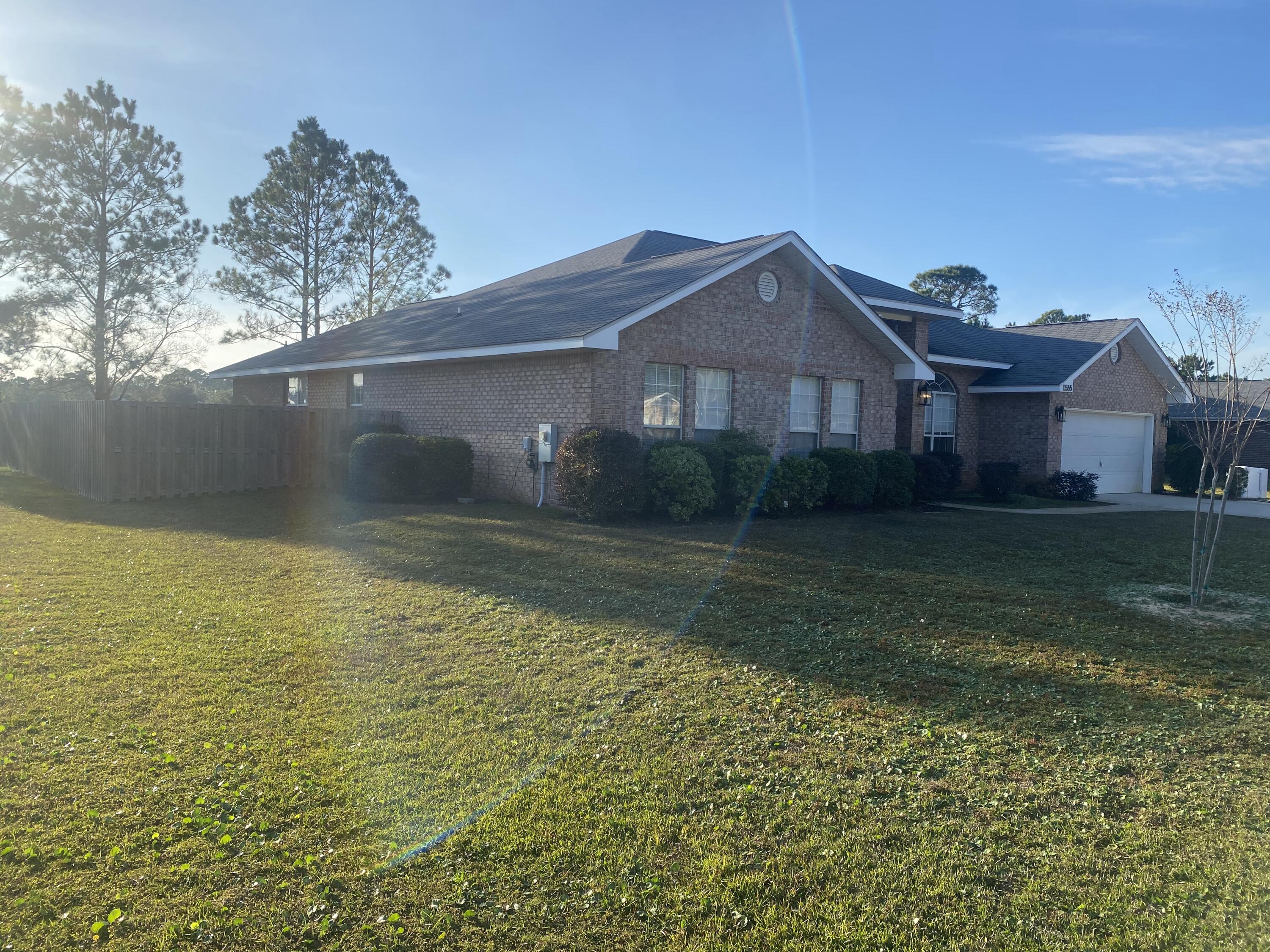 Large fenced in back yard with beautiful sunsets overlooking the lake and park.    Large Kitchen with Kitchen Aid appliances.    Master bath has an oversized soaking tub and oversized glass shower. 
LVP flooring thought.  Also has a front office.