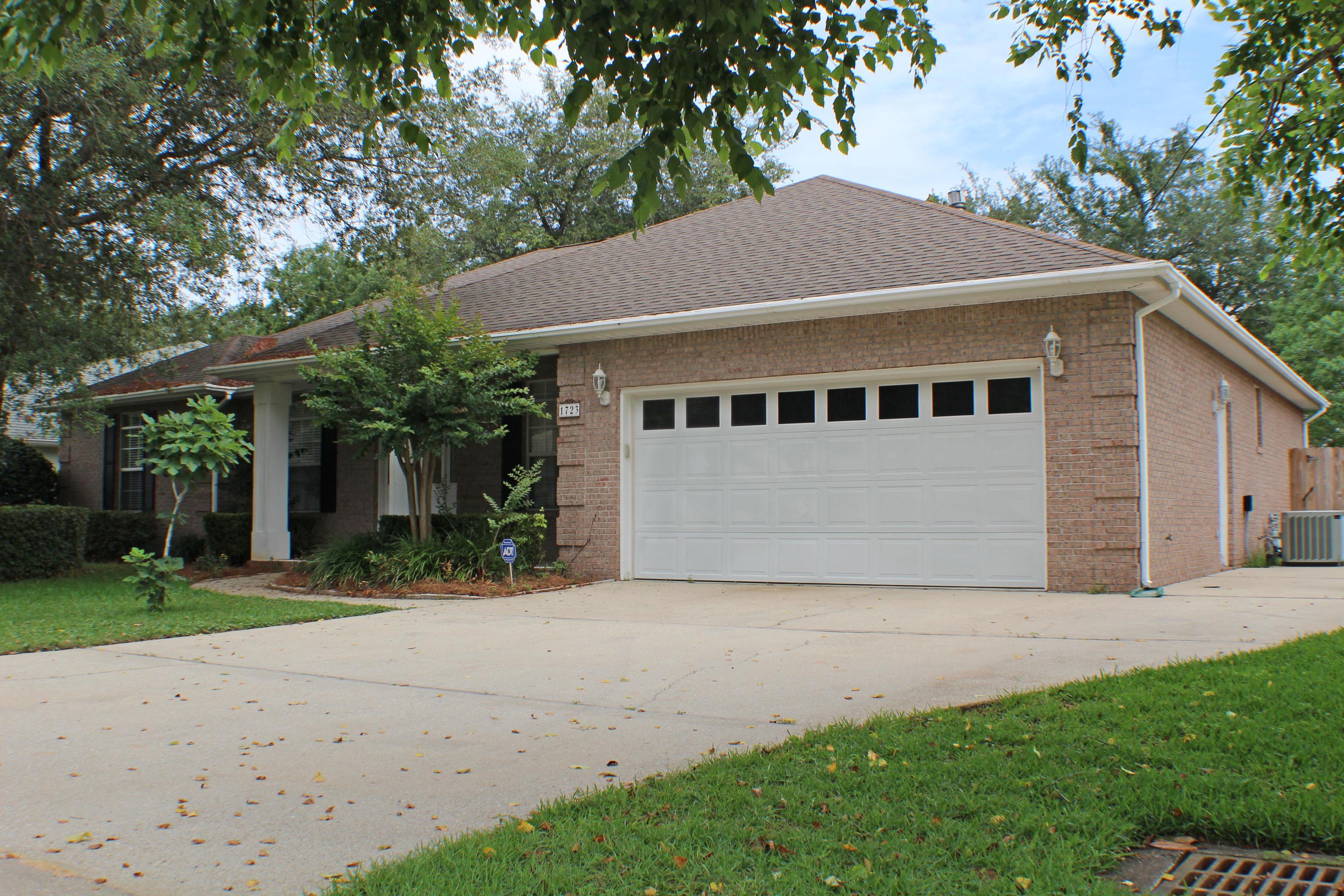 As you approach this home you are greeted by a covered front porch. Through the front door is a small foyer opening up to your dining room on the right. To your left is a bedroom/office with a half bath. The floor plan opens up to your living room complete with a fireplace and French doors leading out to your enclosed porch, fenced-in backyard, and in-ground pool. The kitchen has room for a breakfast nook, and the breakfast bar providing plenty of cabinet and countertop space - perfect for entertaining. Through the kitchen and past the dining room is your massive master suite. The master bathroom has a walk-in closet, double vanity sinks, and garden tub with separate shower. Back through the living room on the other wing of the home is your full hall bathroom and three additional bedrooms.
