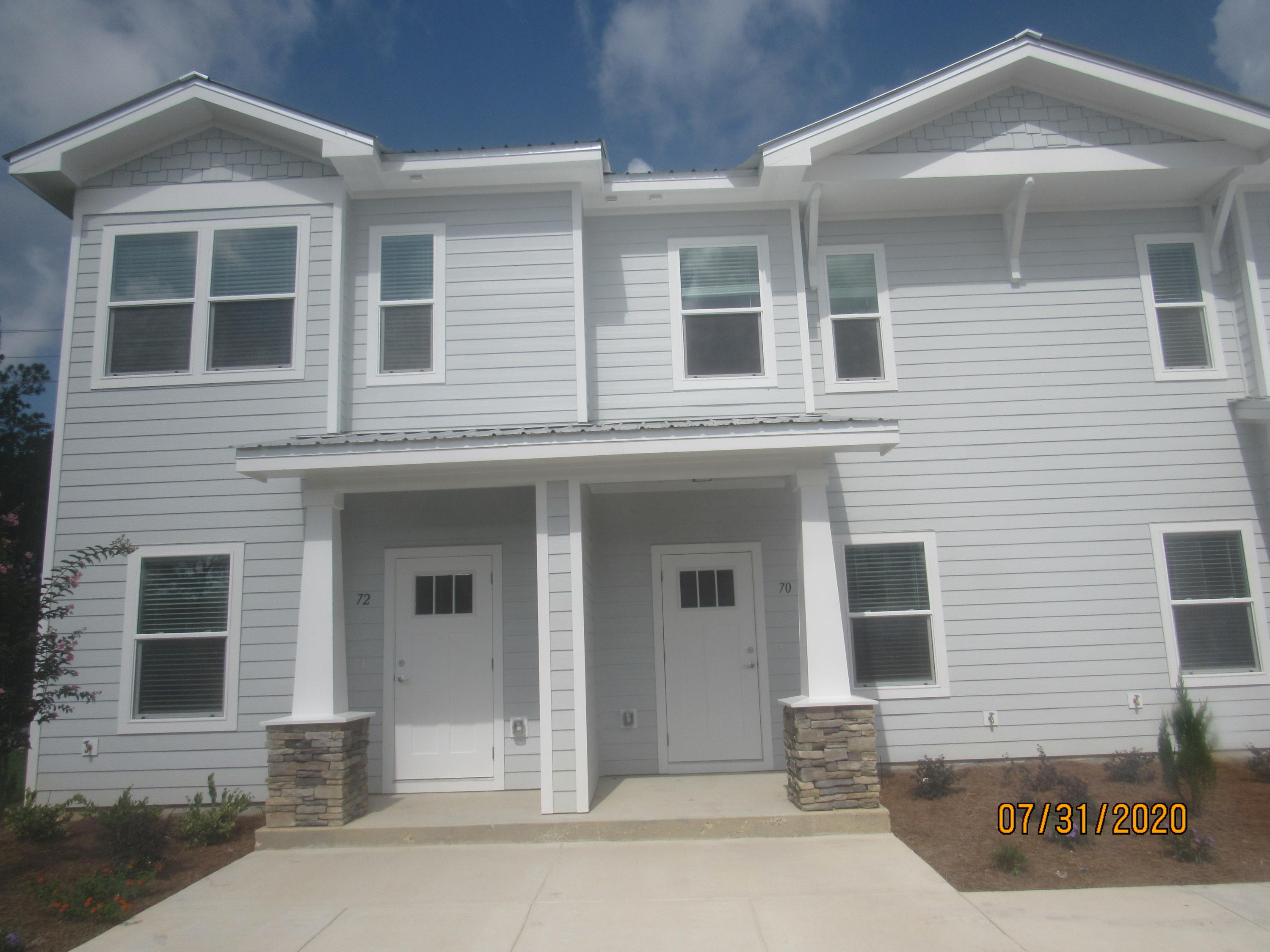 This fabulous, 2 bedroom, 2.5 bath town home has tons of upgrades and a community pool! It's just across the street from an elementary school, just down the road from a Publix shopping center, and a short, easy commute to the sugar sand beaches and emerald waters of 30a/SOWAL. It has fresh, neutral paint and no carpet throughout. The open floor plan on the first level includes a nice size living room with nook, eat-in kitchen with breakfast bar, gorgeous counter tops, plenty of counter/cabinet space, stainless appliances (including a flat cook top stove), and a beautiful back splash, as well as a half guest bath with pedestal sink and a screened-in back porch. Upstairs, you will find two spacious bedrooms, each with their own full bath. Also upstairs is the laundry room (washer and dryer included in rental). There is plenty of storage. Pool care, lawn care, and garbage are included in the rent. Pets may be considered on a case-by-case basis with prior owner approval and a non-refundable pet fee. NO SMOKING, including vapes.
